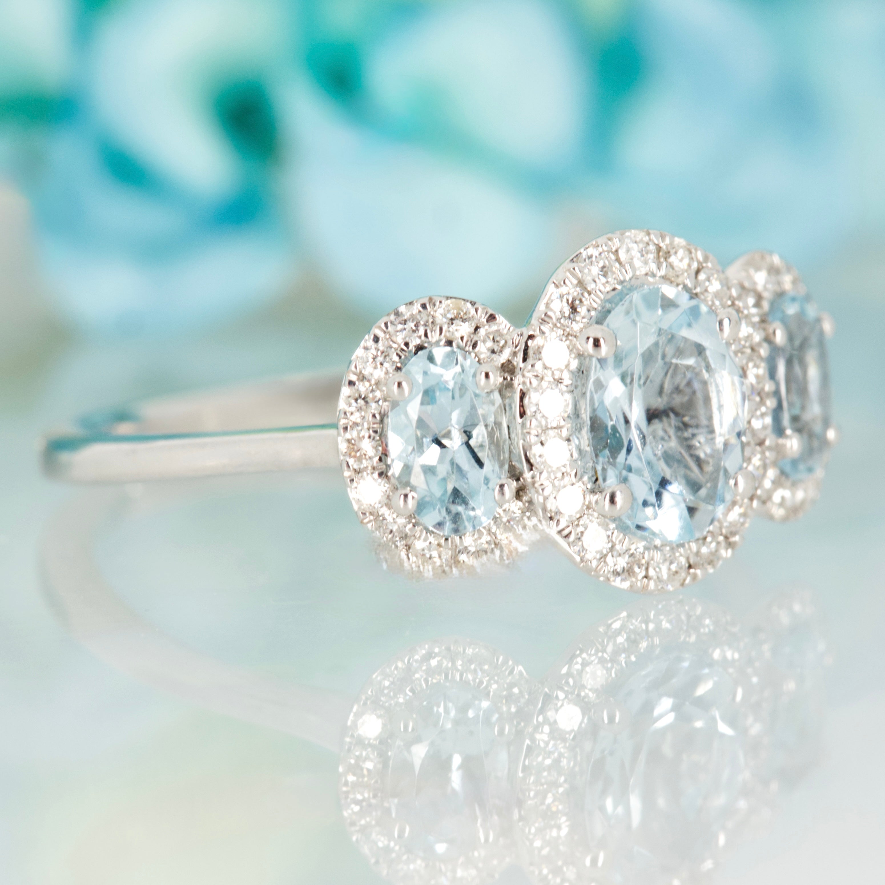 9ct White Gold Oval Cut Aquamarine & Round Brilliant Cut Diamond Triple Halo Cluster Ring