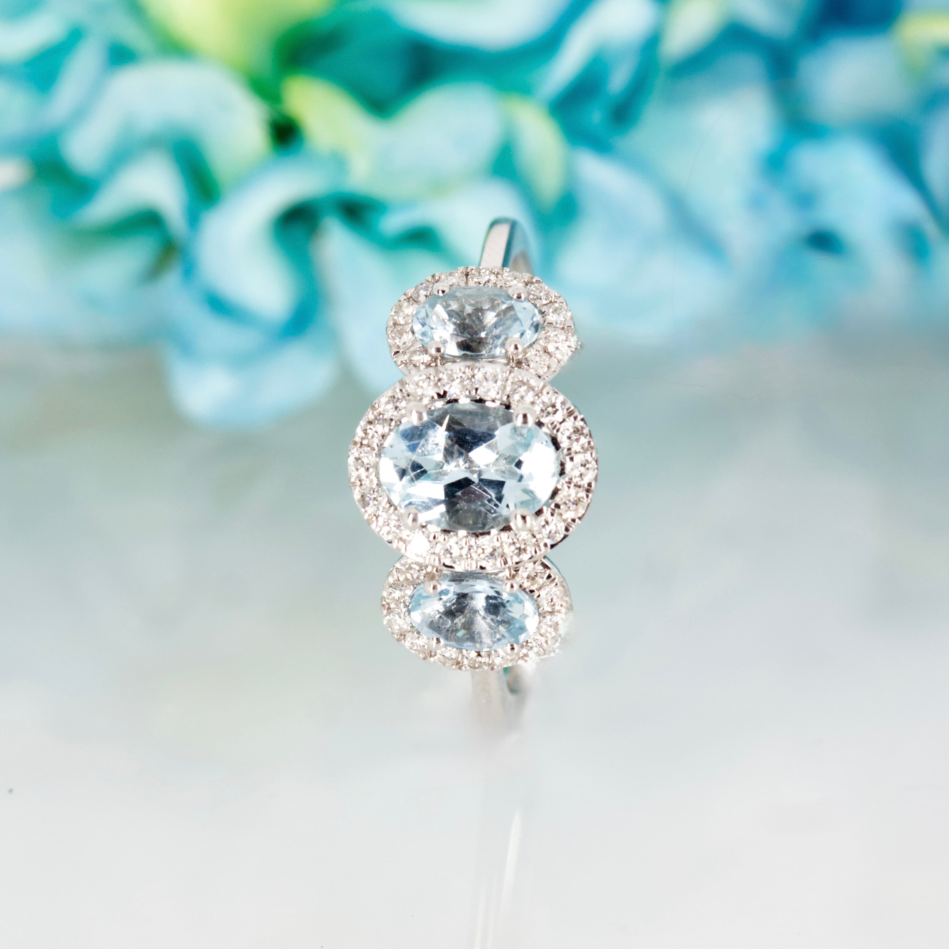 9ct White Gold Oval Cut Aquamarine & Round Brilliant Cut Diamond Triple Halo Cluster Ring