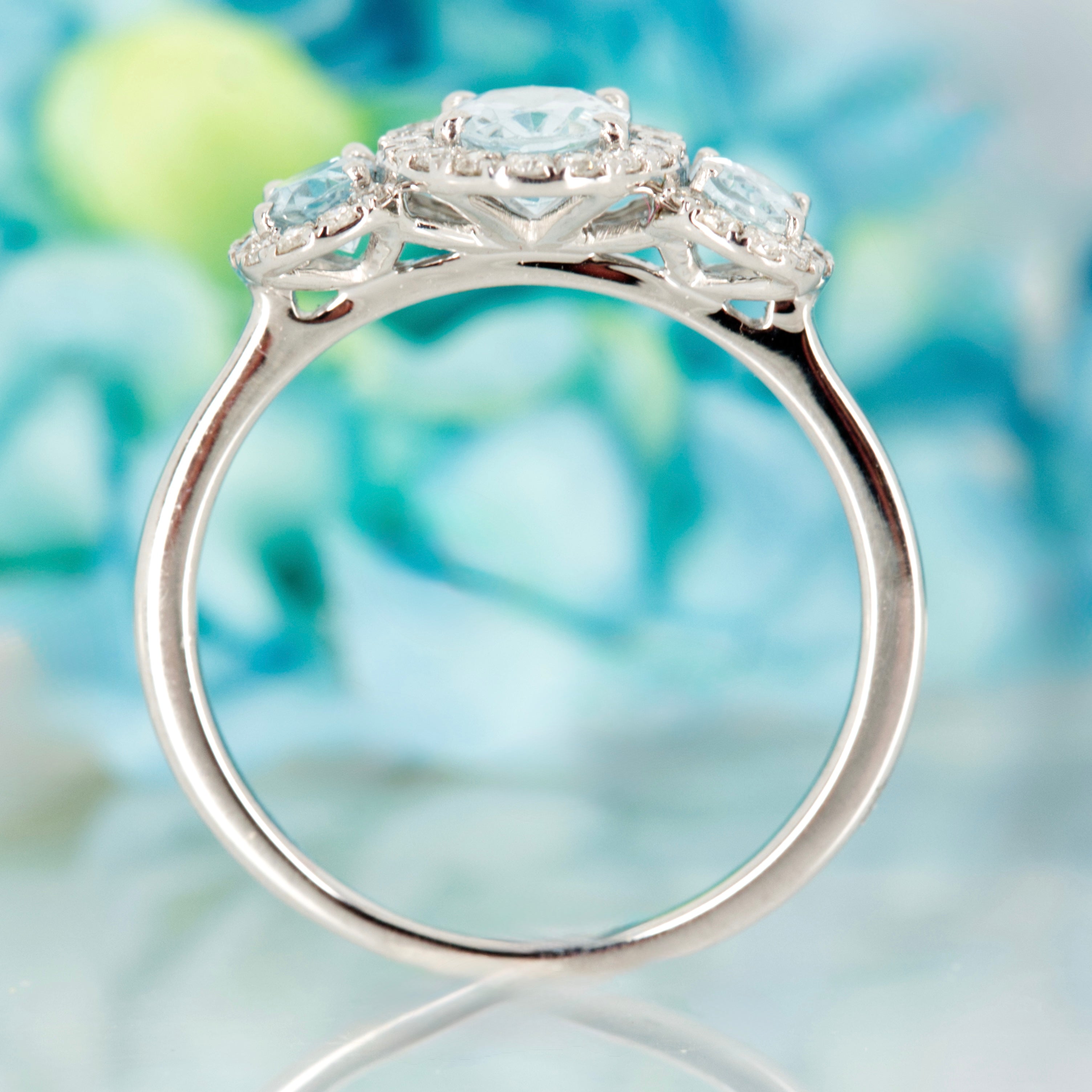 9ct White Gold Oval Cut Aquamarine & Round Brilliant Cut Diamond Triple Halo Cluster Ring