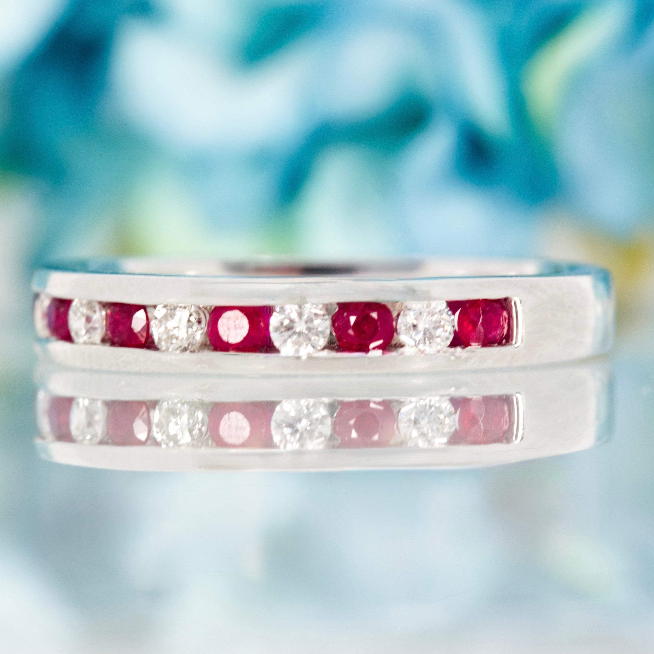Platinum Round Cut Ruby & Diamond Channel Set Half Eternity Ring