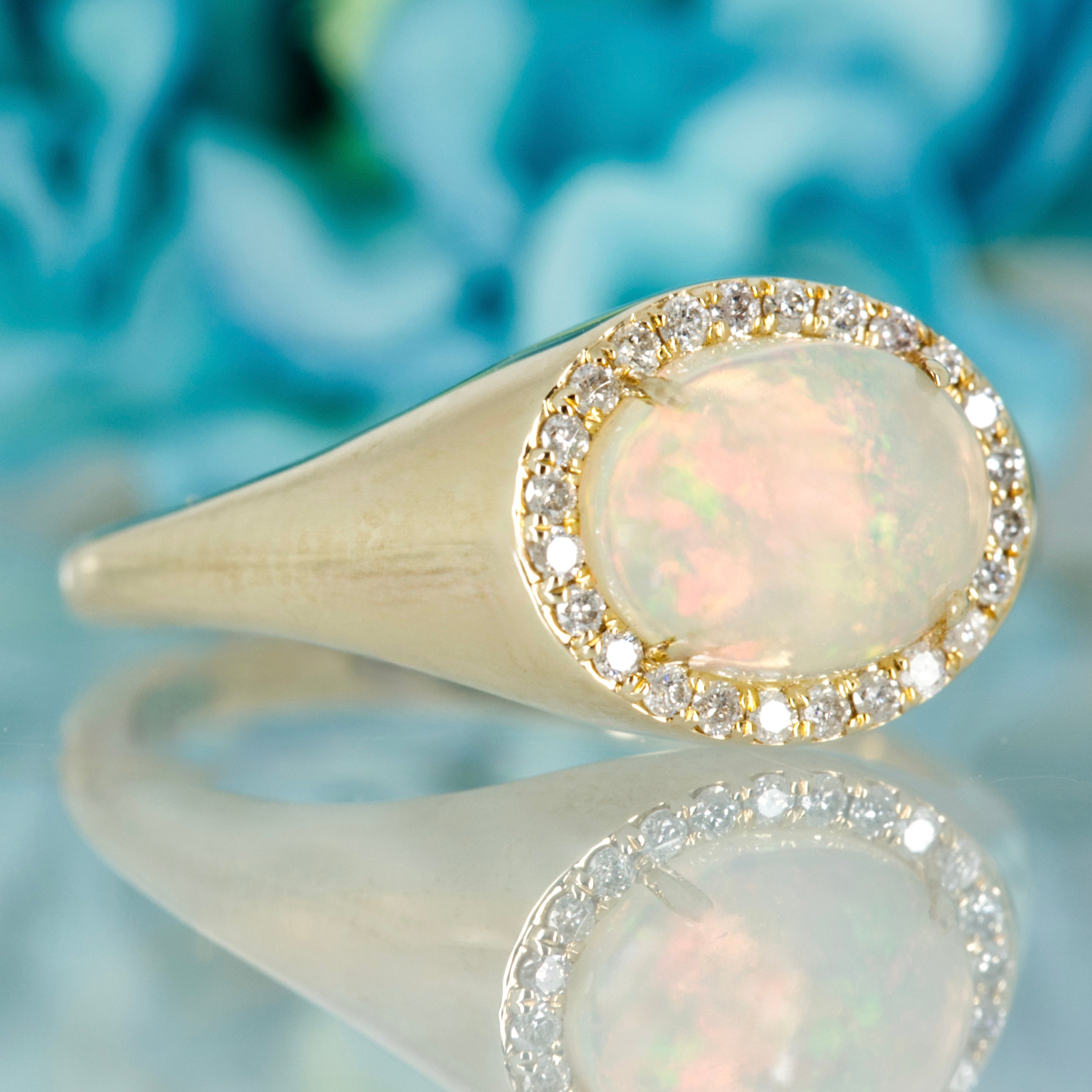 9ct Yellow Gold Oval Shaped Opal & Round Brilliant Cut Diamond Horizontal Cluster Ring