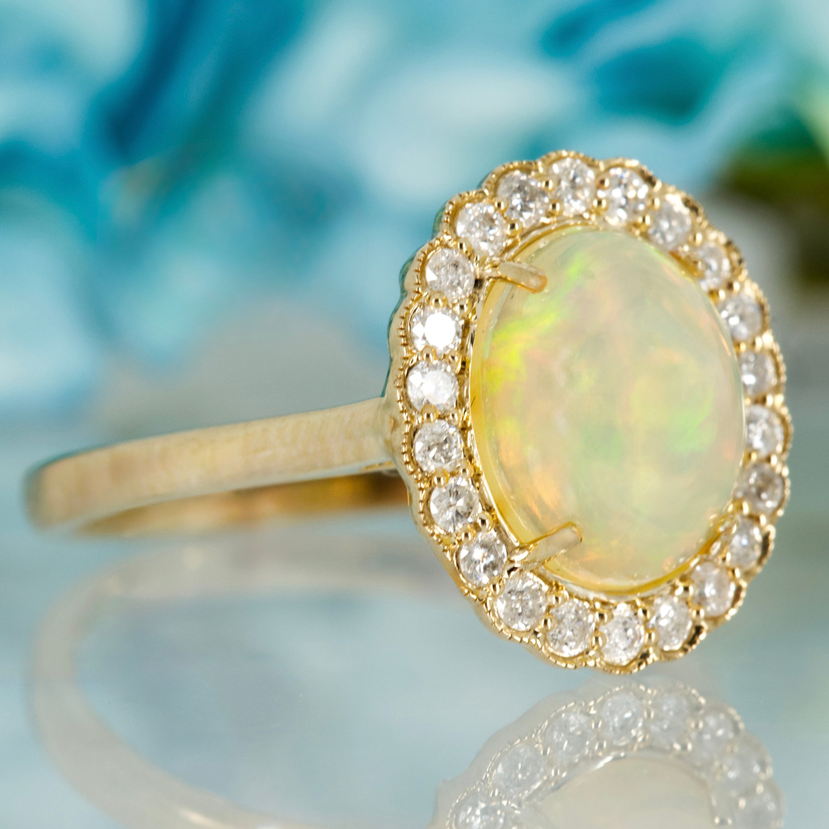 9ct Yellow Gold Oval Shaped Opal & Round Brilliant Cut Diamond Cluster Ring