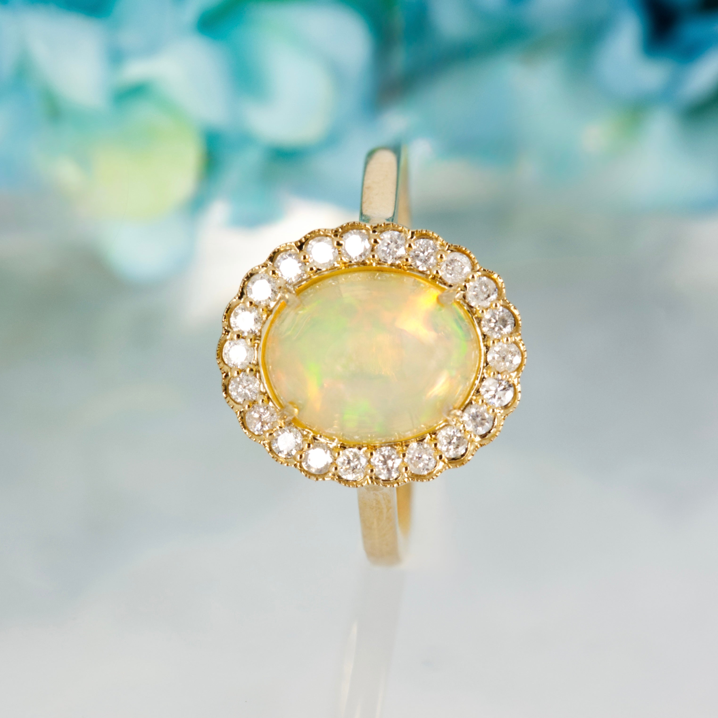 9ct Yellow Gold Oval Shaped Opal & Round Brilliant Cut Diamond Cluster Ring