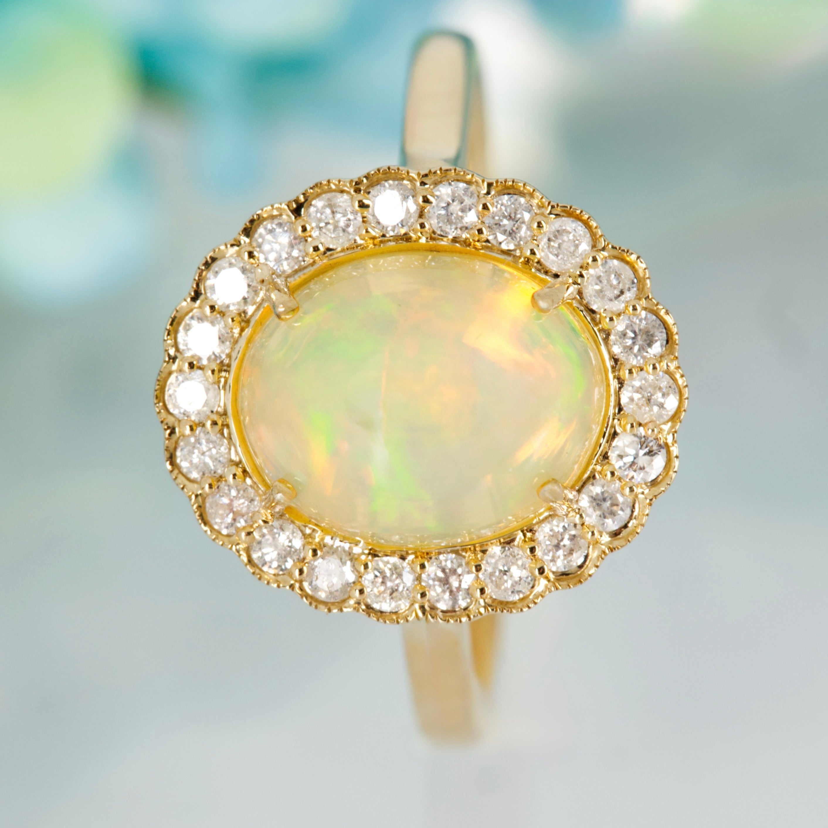 9ct Yellow Gold Oval Shaped Opal & Round Brilliant Cut Diamond Cluster Ring