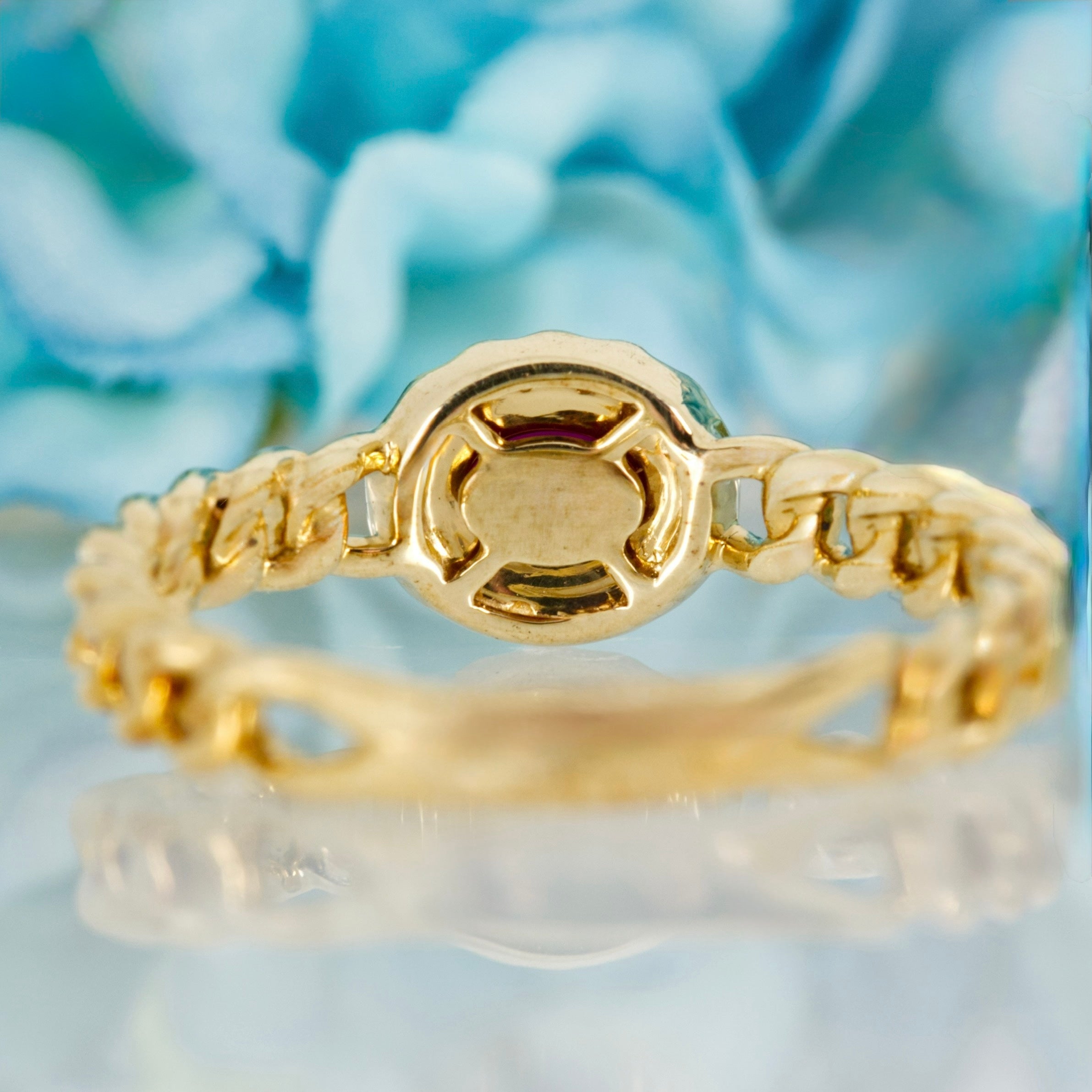 9ct Yellow Gold Oval Cut Ruby & Round Brilliant Cut Diamond Horizontal Halo Cluster Ring