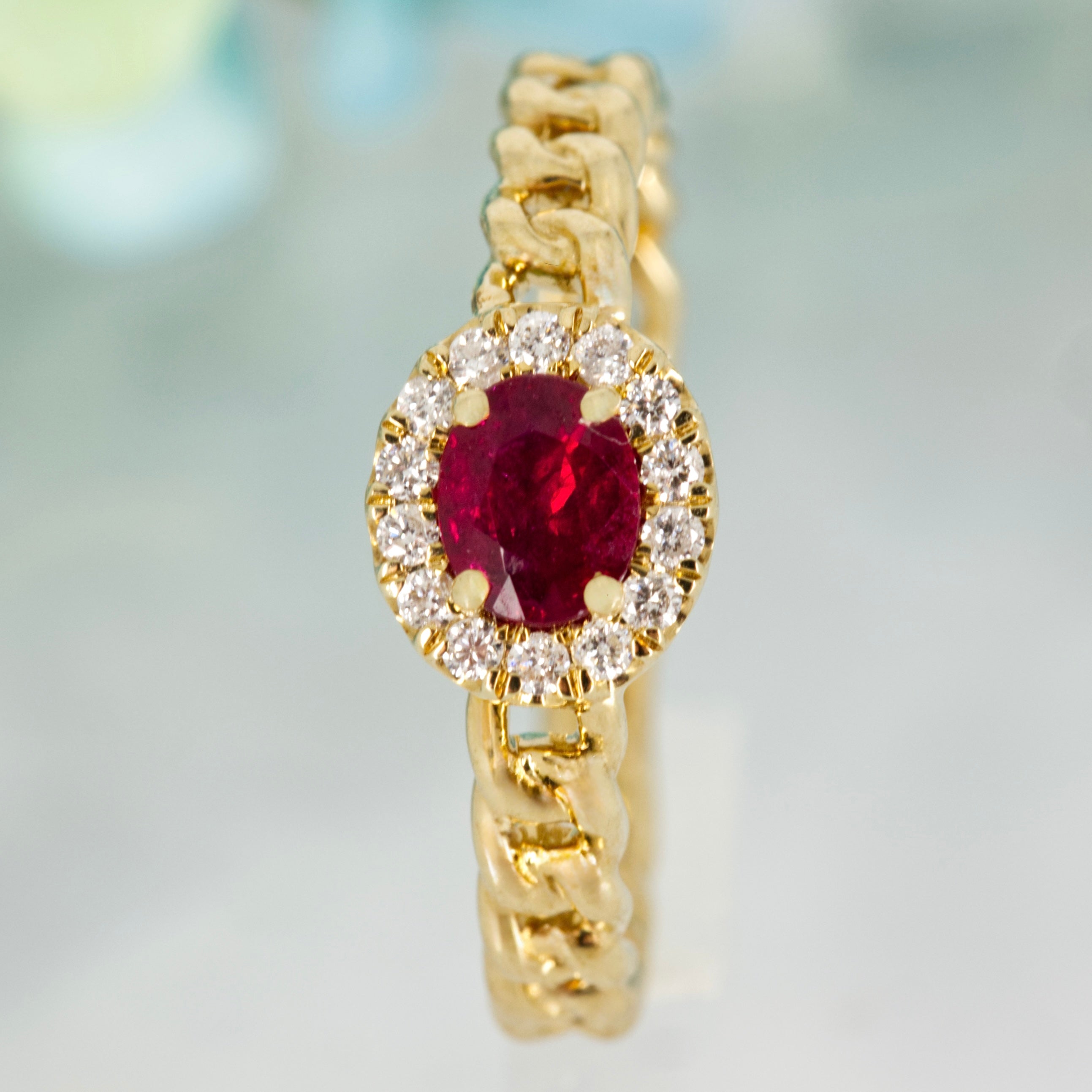 9ct Yellow Gold Oval Cut Ruby & Round Brilliant Cut Diamond Horizontal Halo Cluster Ring