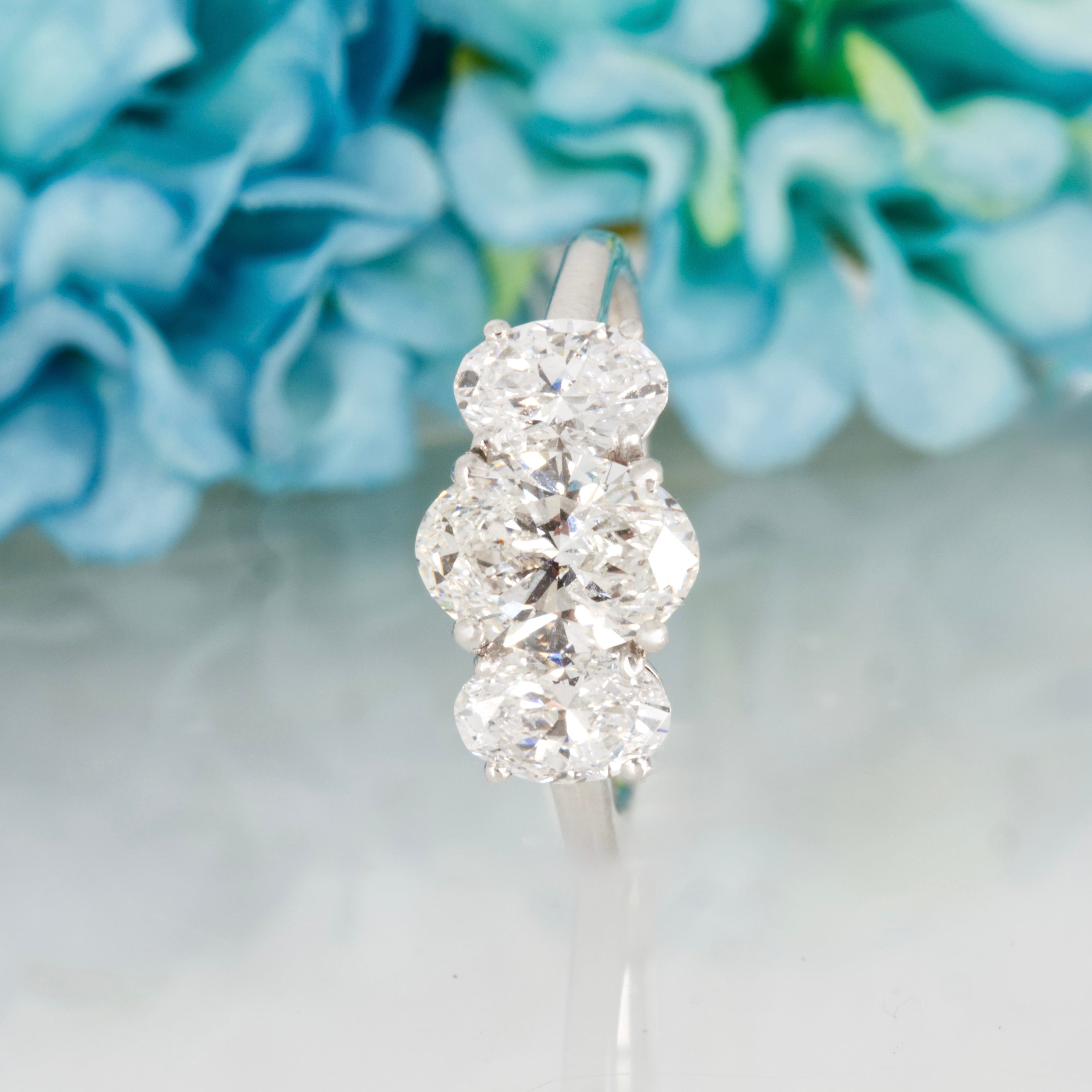 9ct White Gold 3.07ct Oval Cut Lab Grown Diamond Trilogy Ring