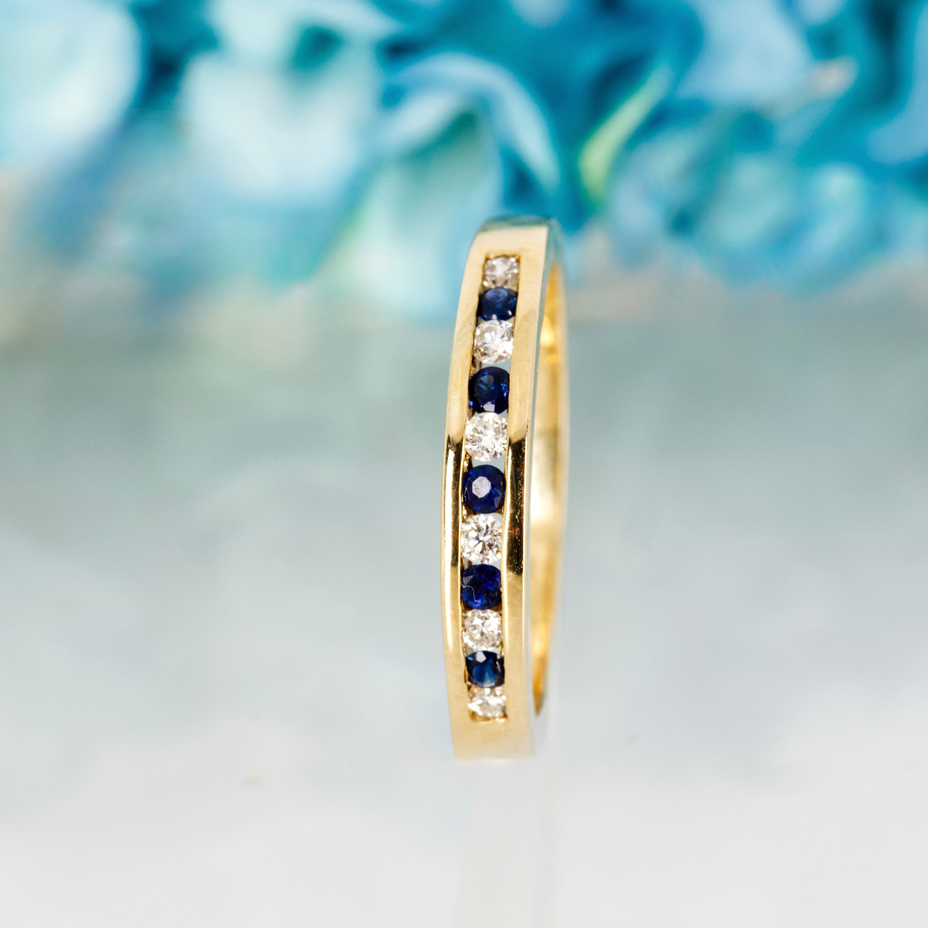 9ct Yellow Gold Round Cut Sapphire & Diamond Channel Set Half Eternity Ring