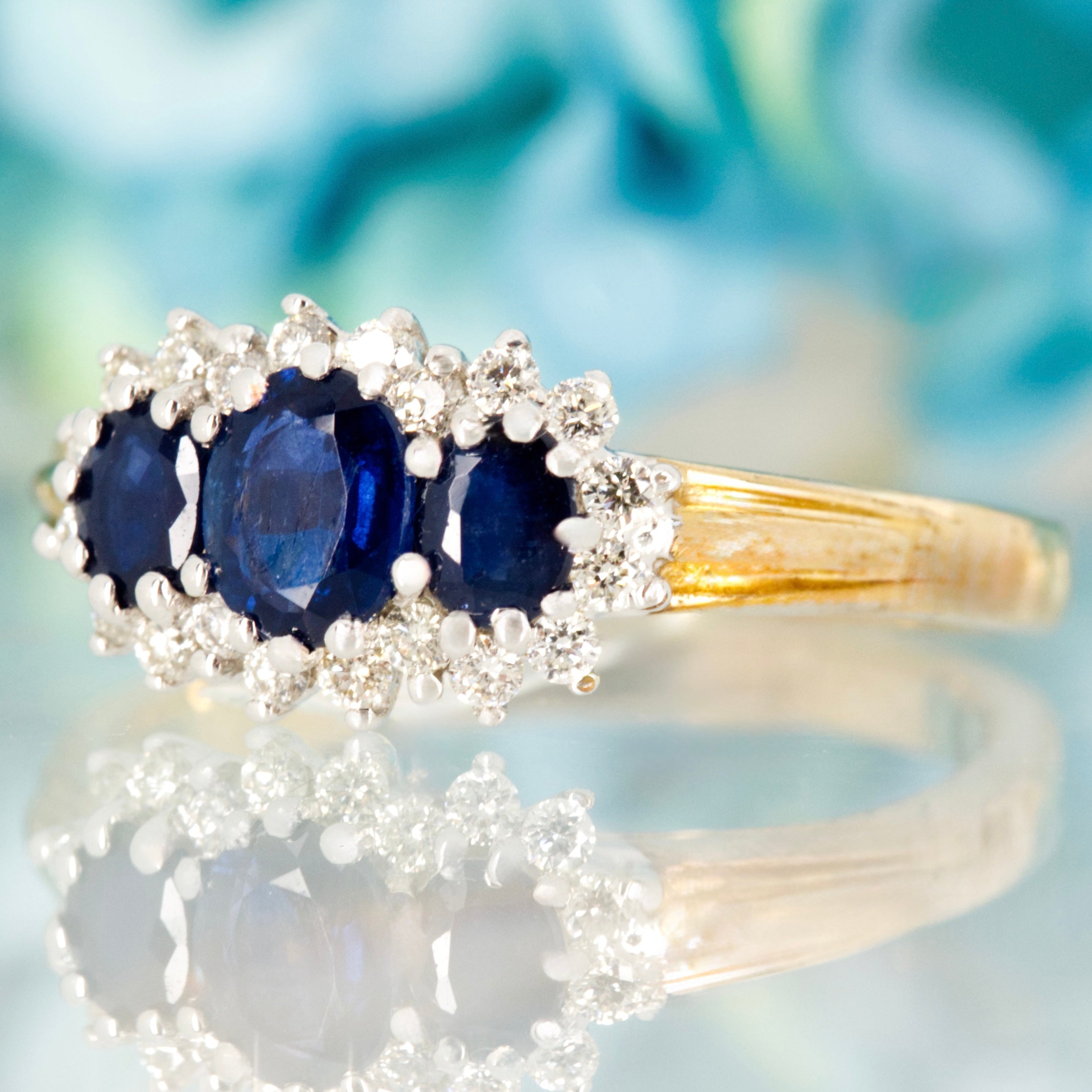 9ct Yellow Gold Oval Cut Sapphire & Round Brilliant Cut Diamond Triple Cluster Ring