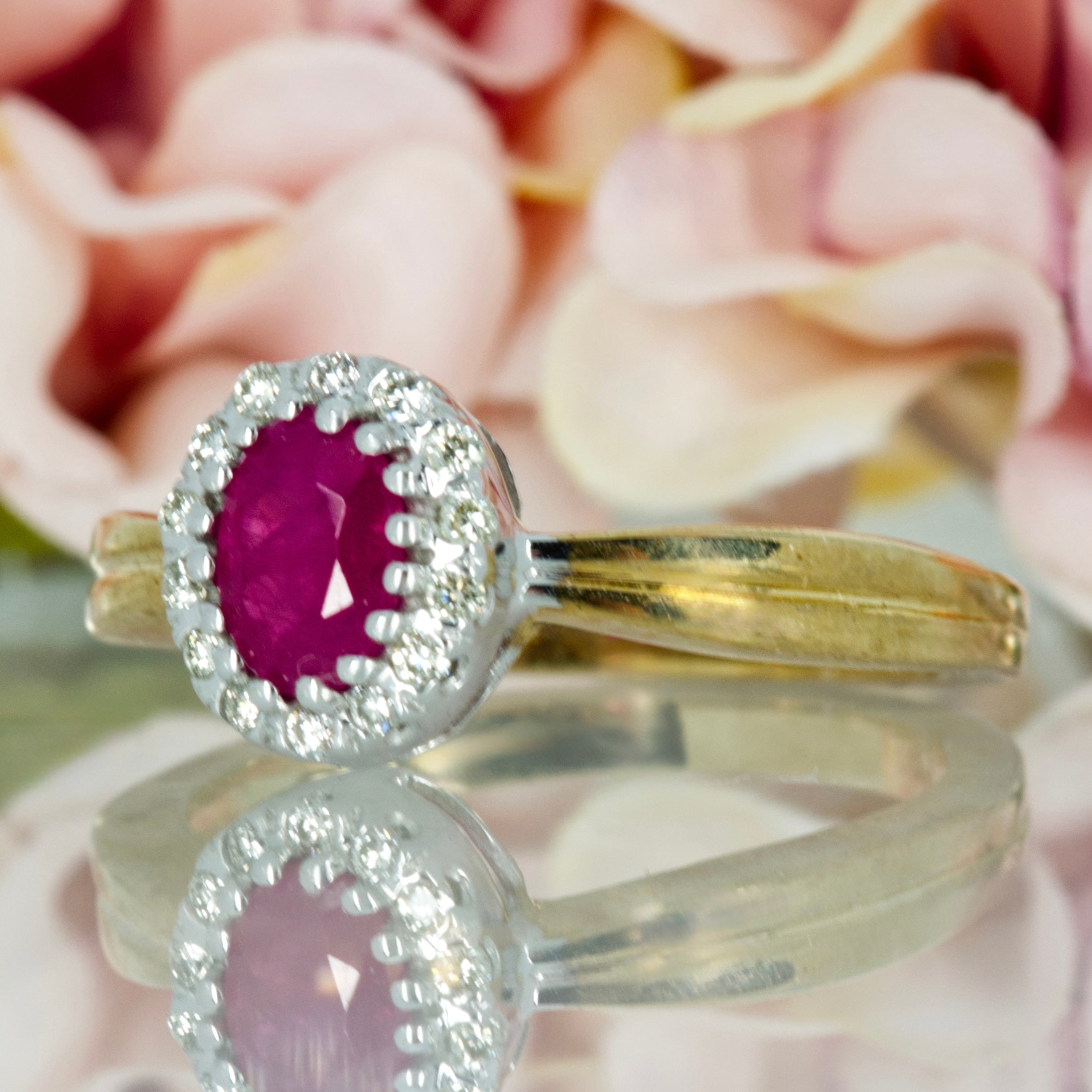 9ct Yellow Gold Oval Cut Ruby & Round Brilliant Cut Diamond Halo Cluster Ring