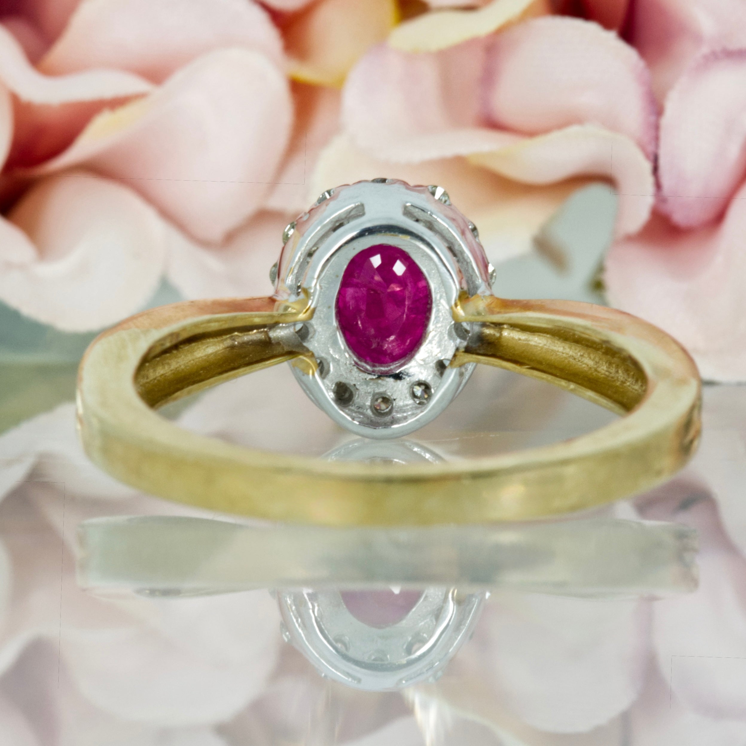 9ct Yellow Gold Oval Cut Ruby & Round Brilliant Cut Diamond Halo Cluster Ring