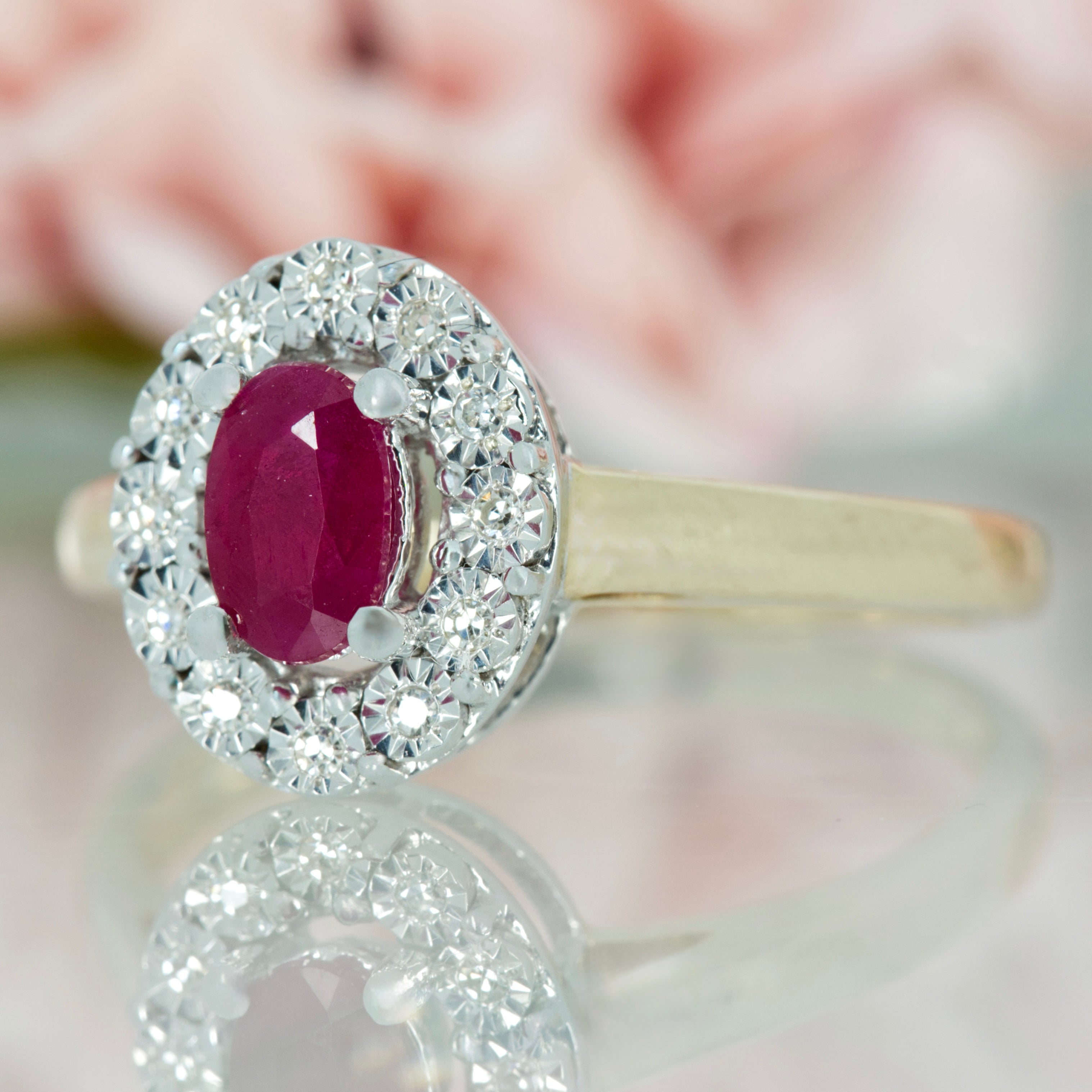 9ct Yellow Gold Oval Cut Ruby & Round Brilliant Cut Diamond Halo Cluster Ring