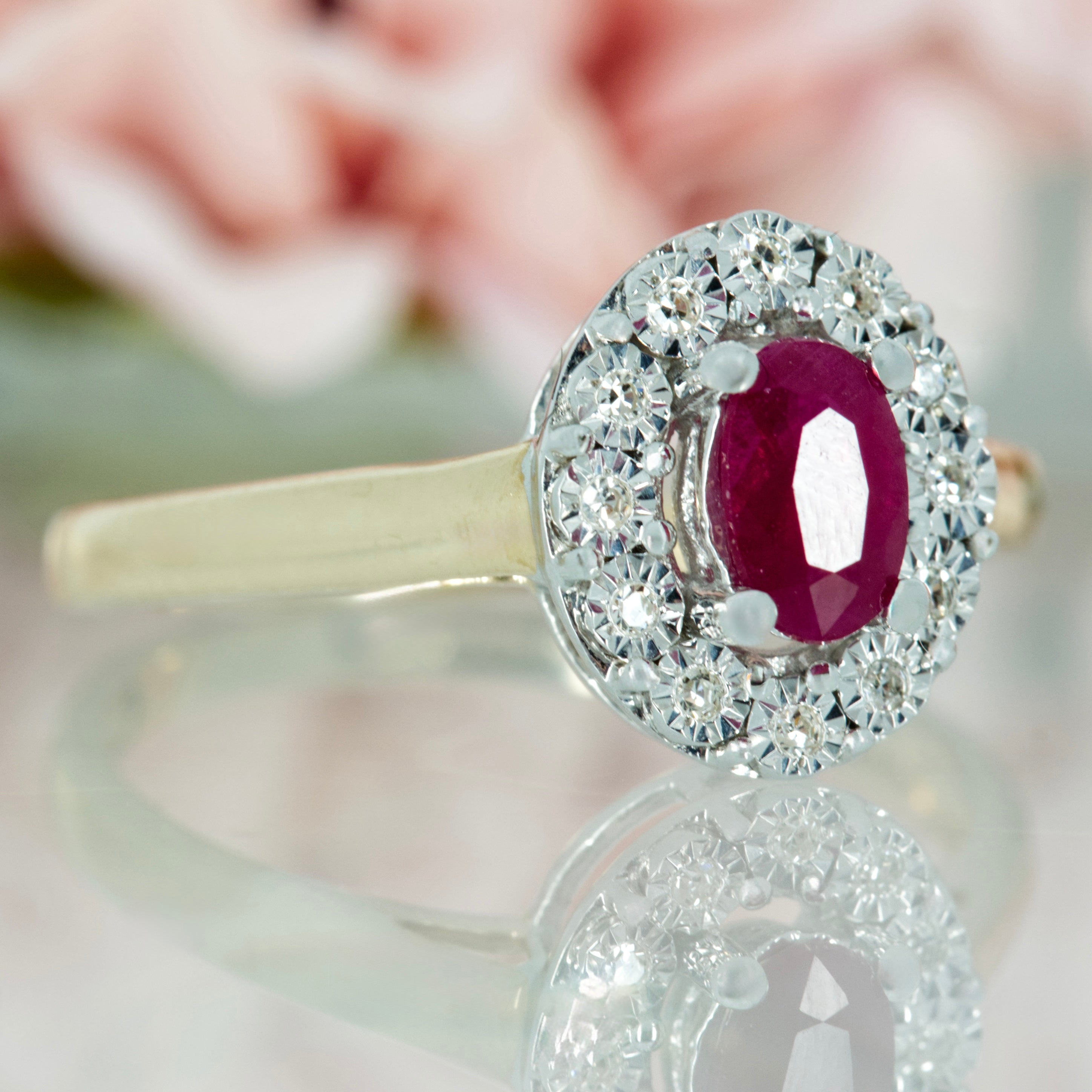 9ct Yellow Gold Oval Cut Ruby & Round Brilliant Cut Diamond Halo Cluster Ring