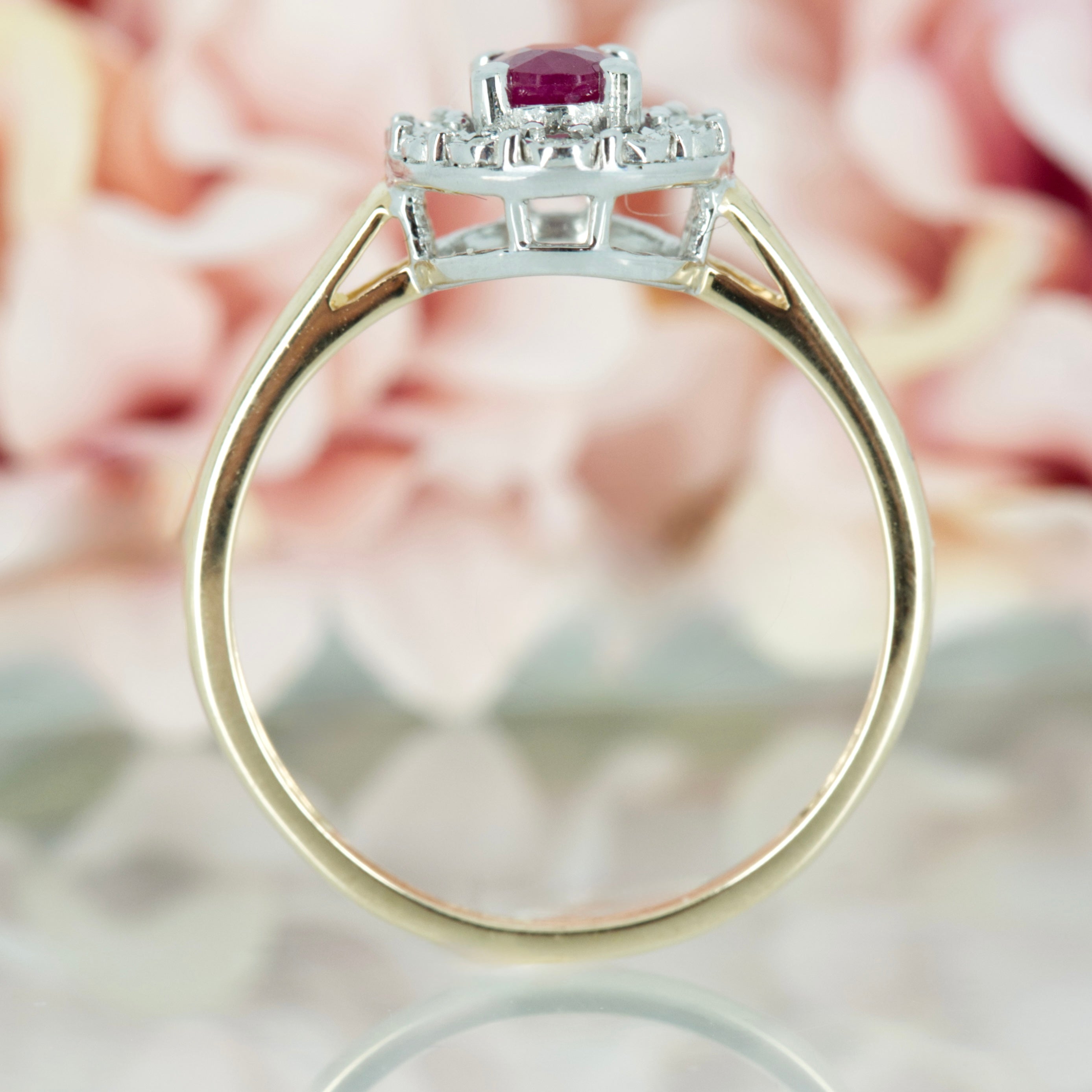 9ct Yellow Gold Oval Cut Ruby & Round Brilliant Cut Diamond Halo Cluster Ring
