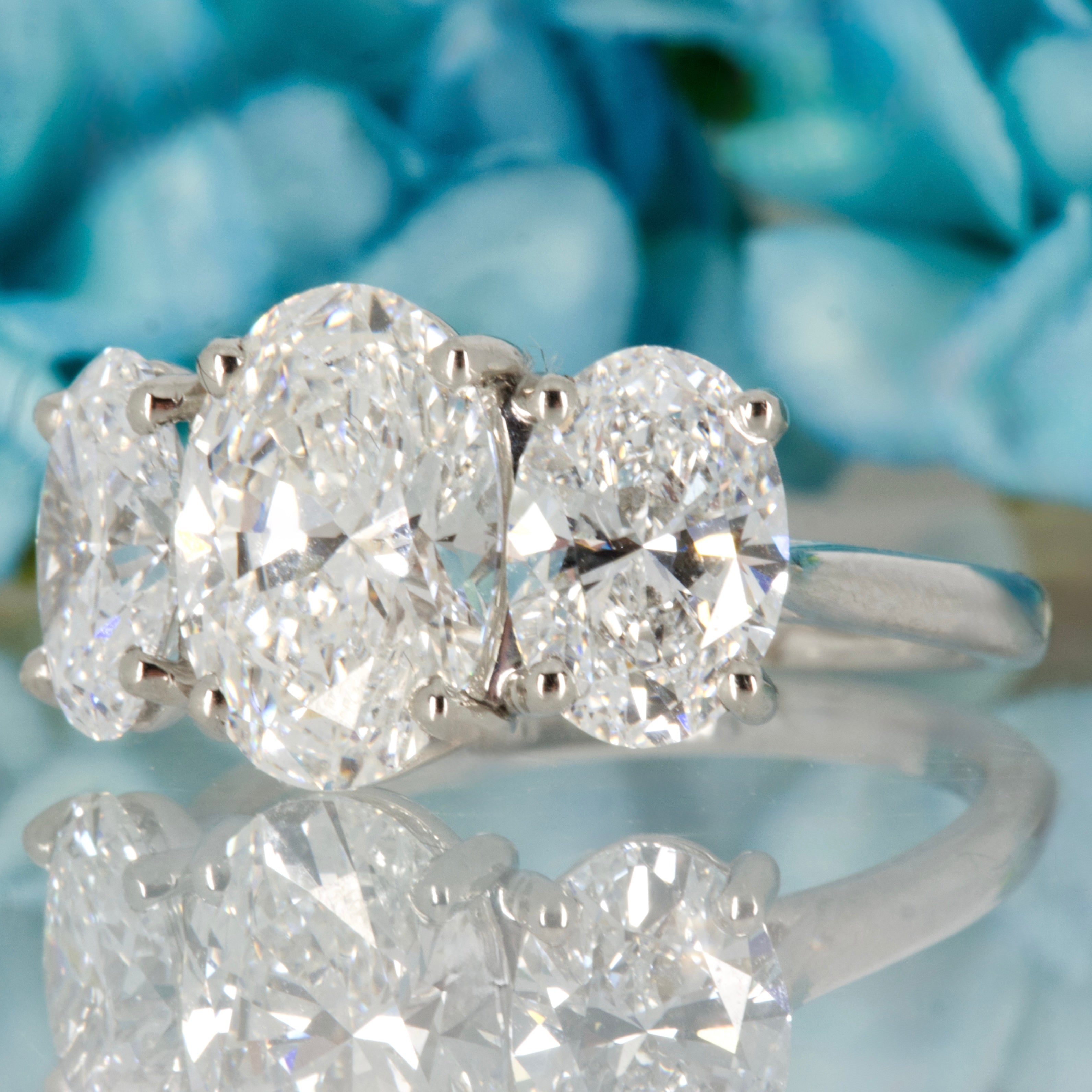 Platinum 5.04ct Oval Cut Lab Grown Diamond Trilogy Ring