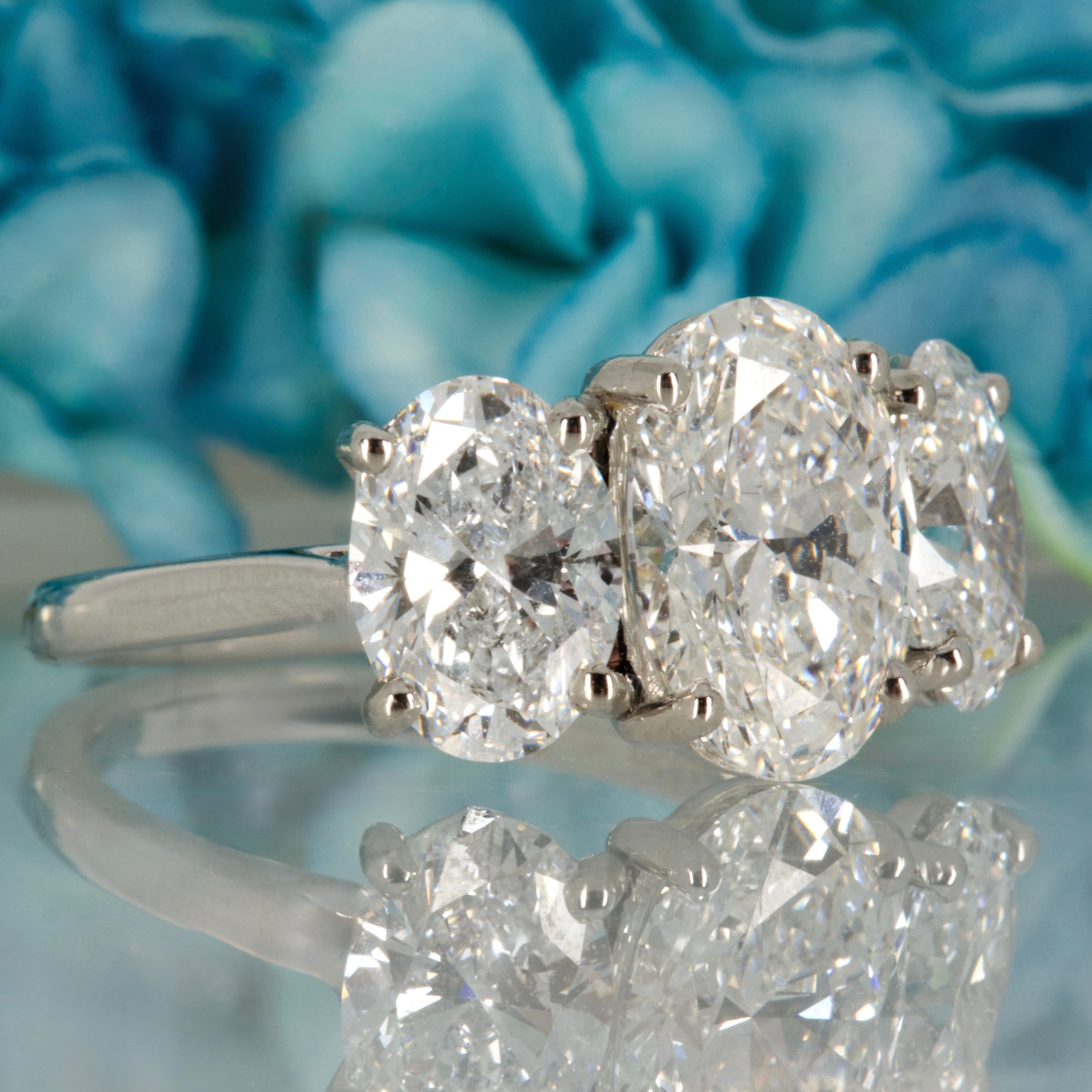 Platinum 5.04ct Oval Cut Lab Grown Diamond Trilogy Ring