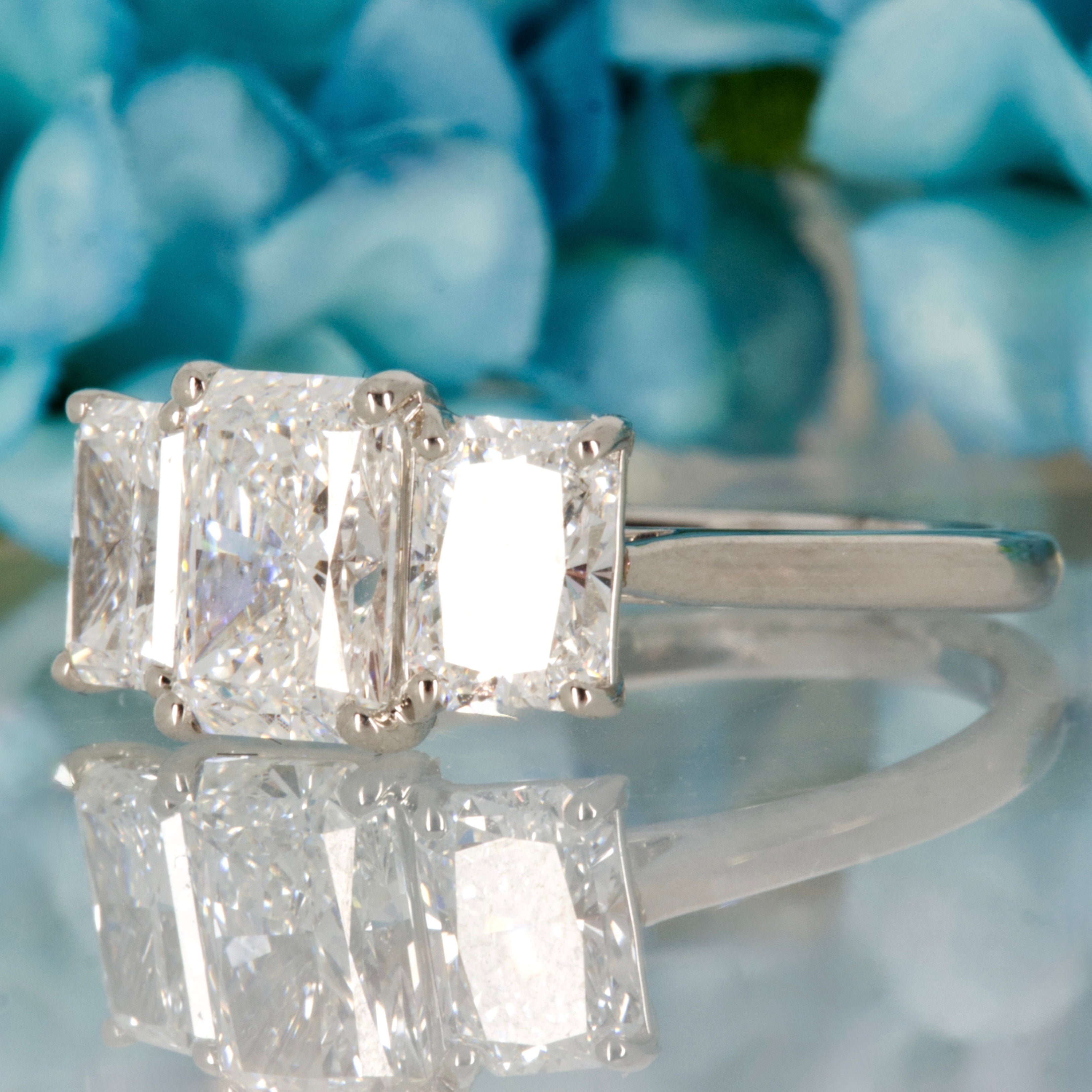 Platinum 3.12ct Radiant Cut Lab Grown Diamond Trilogy Ring