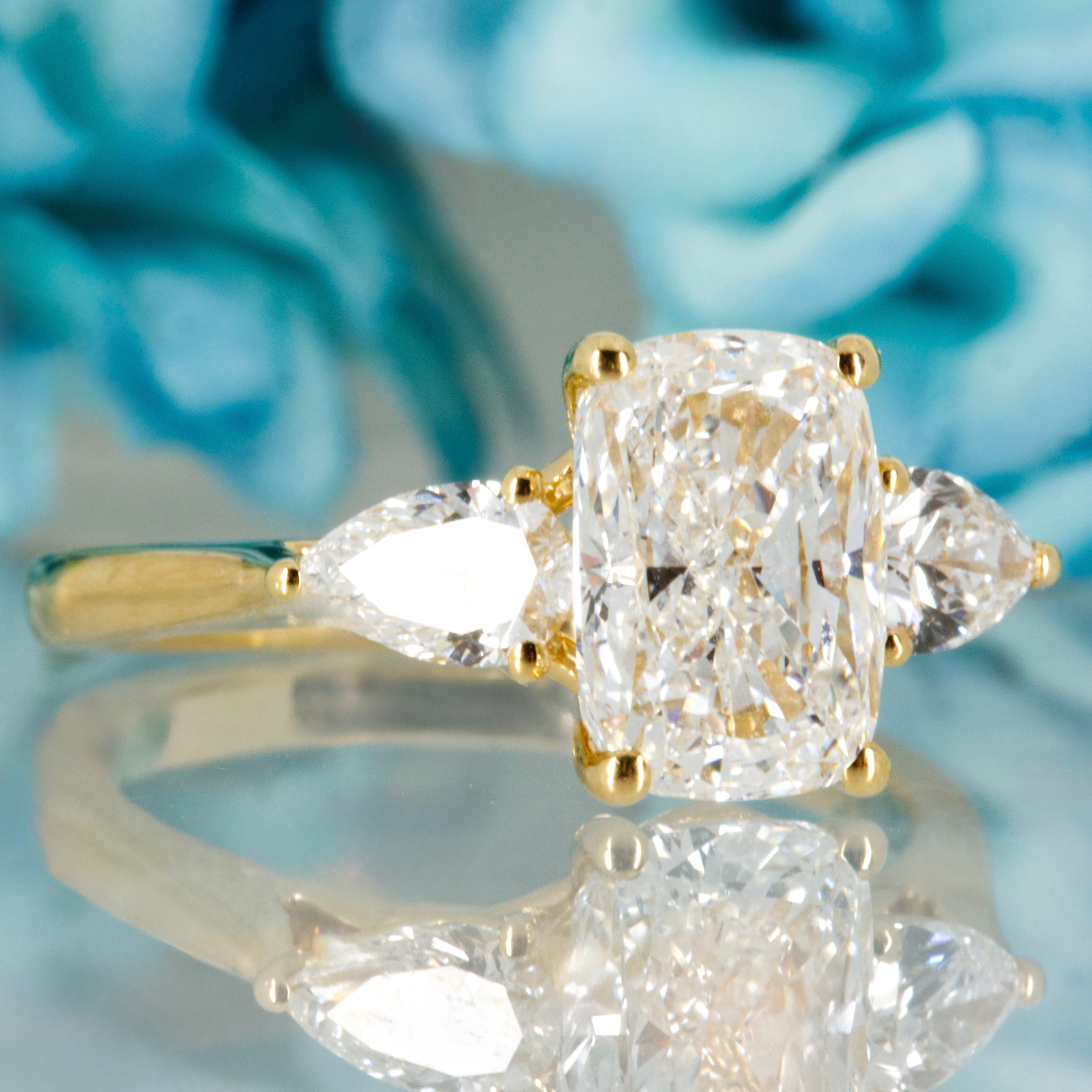 18ct Yellow Gold 2.59ct Cushion & Pear Cut Lab Grown Diamond Trilogy Ring