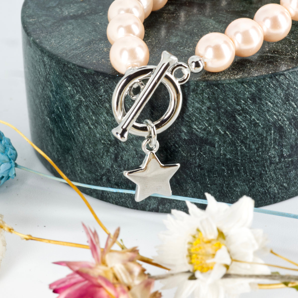 Rhodium Plated Pink Mother-Of-Pearl Bead Bracelet with Star Charm