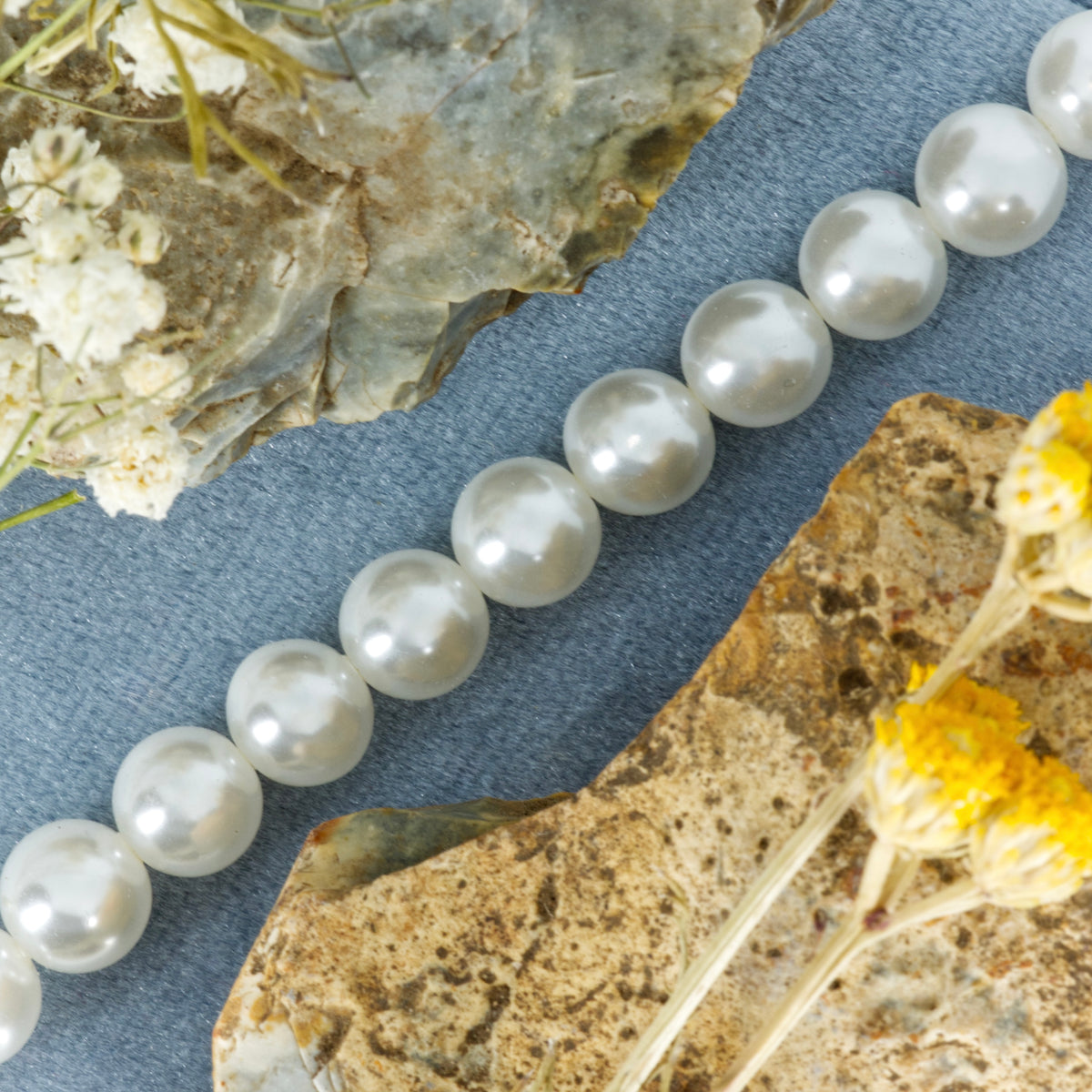 Rhodium Plated Mother-of-Pearl Beaded Bracelet with Bee Charm
