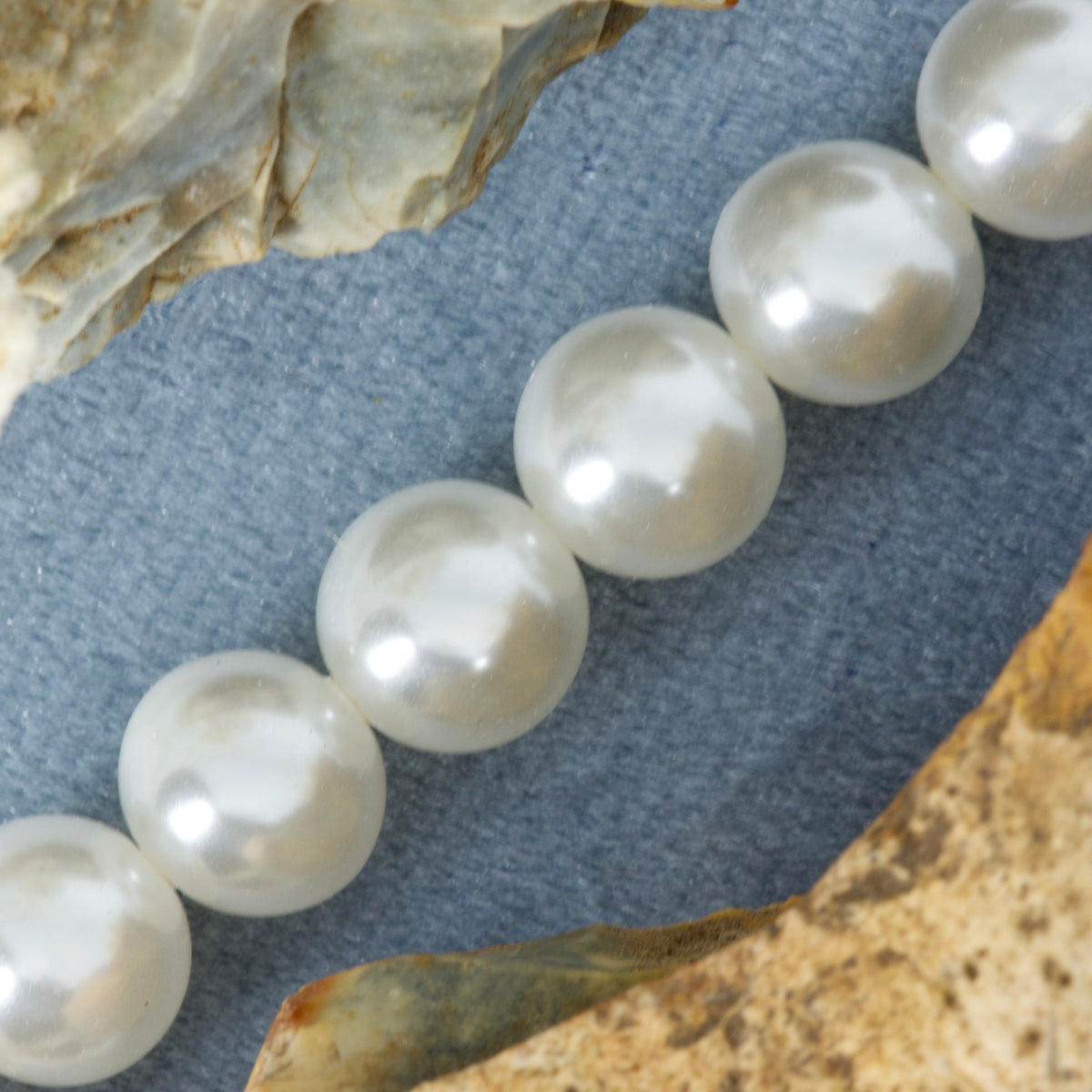 Rhodium Plated Mother-of-Pearl Beaded Bracelet with Bee Charm
