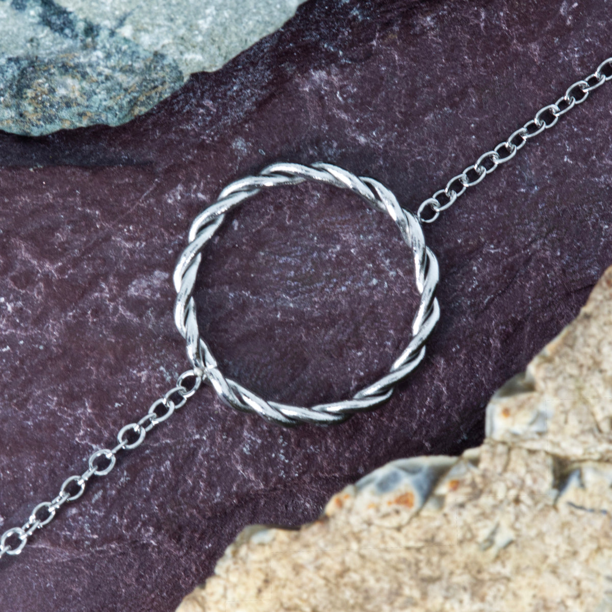 Rhodium Plated Twisted Circle Bracelet