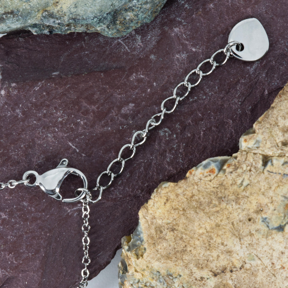 Rhodium Plated Twisted Circle Bracelet