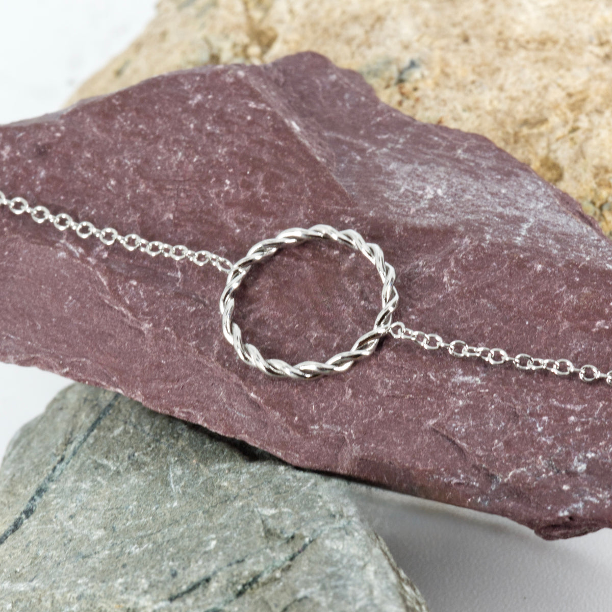 Rhodium Plated Twisted Circle Bracelet