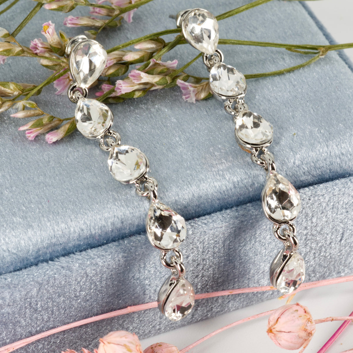 Rhodium Plated Pear Cut Cubic Zirconia Drop Earrings