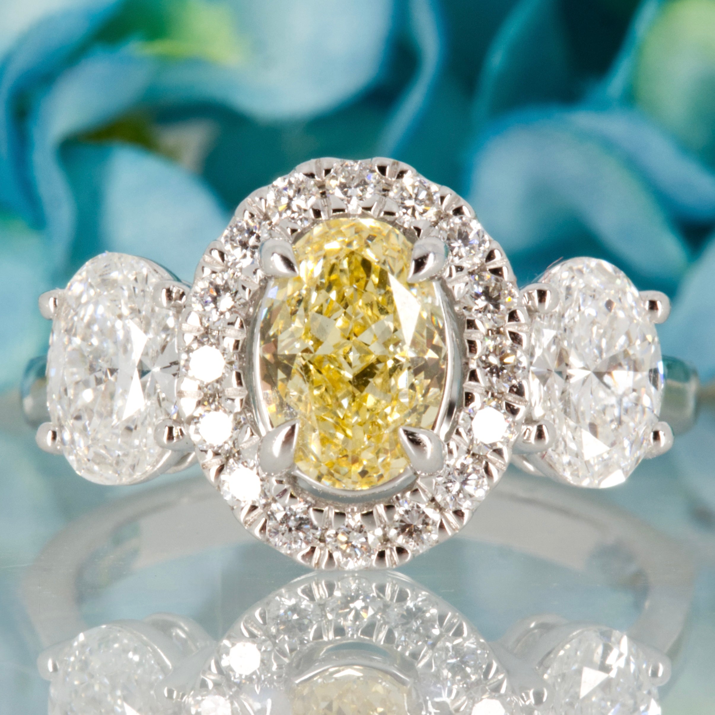 18ct White Gold Oval Cut Lab Grown Yellow Diamond & Lab Grown Diamond Halo Cluster Trilogy Ring