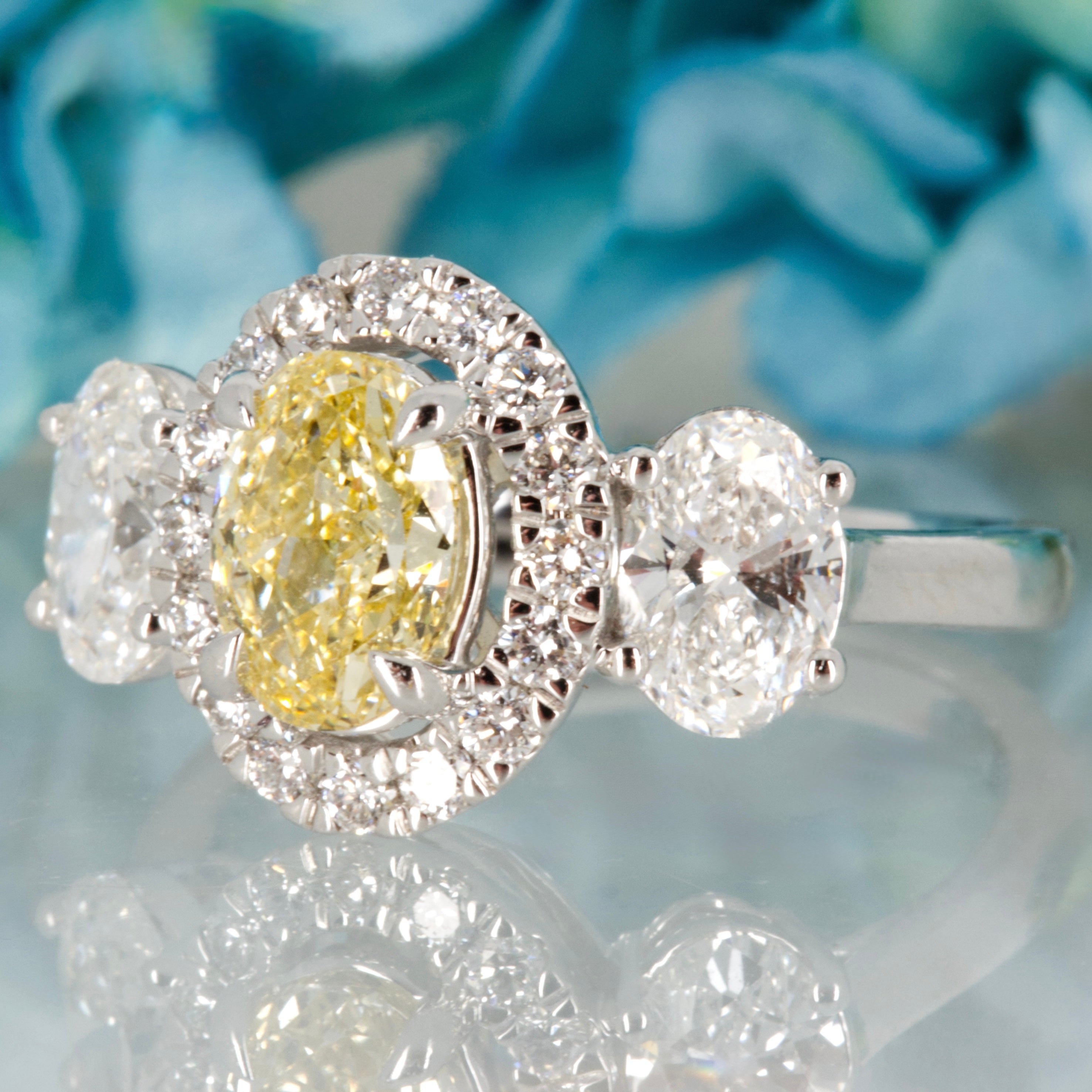 18ct White Gold Oval Cut Lab Grown Yellow Diamond & Lab Grown Diamond Halo Cluster Trilogy Ring