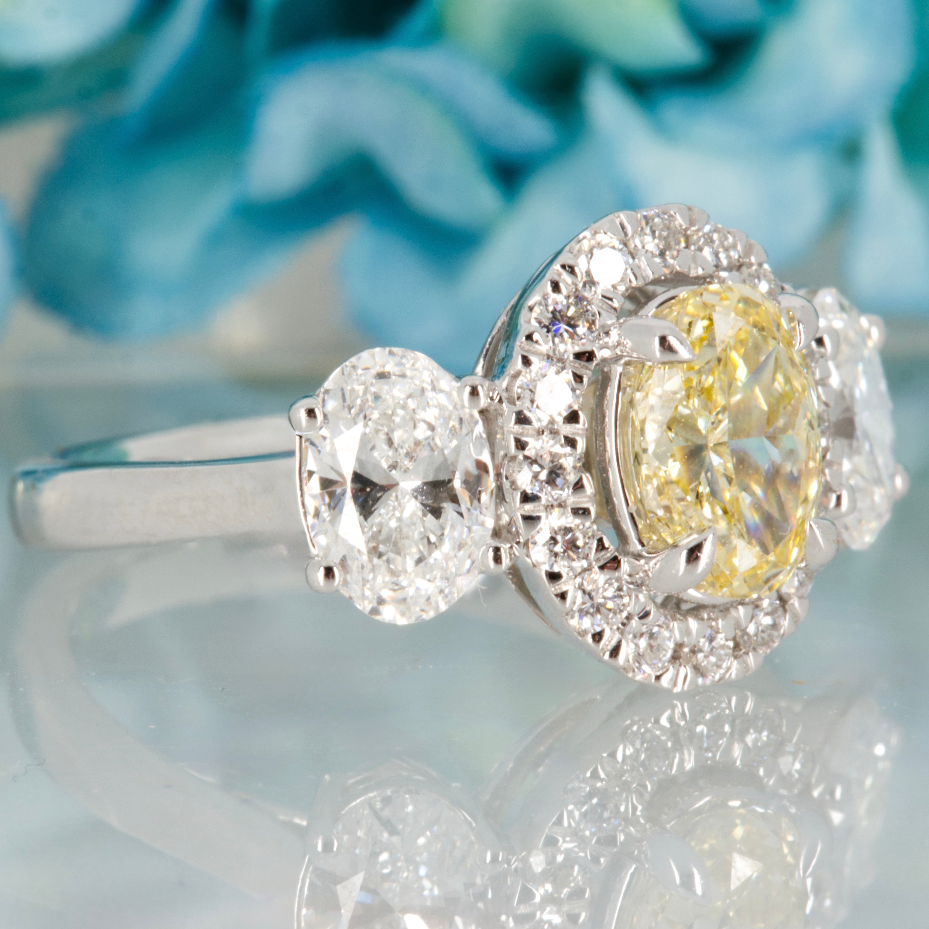18ct White Gold Oval Cut Lab Grown Yellow Diamond & Lab Grown Diamond Halo Cluster Trilogy Ring