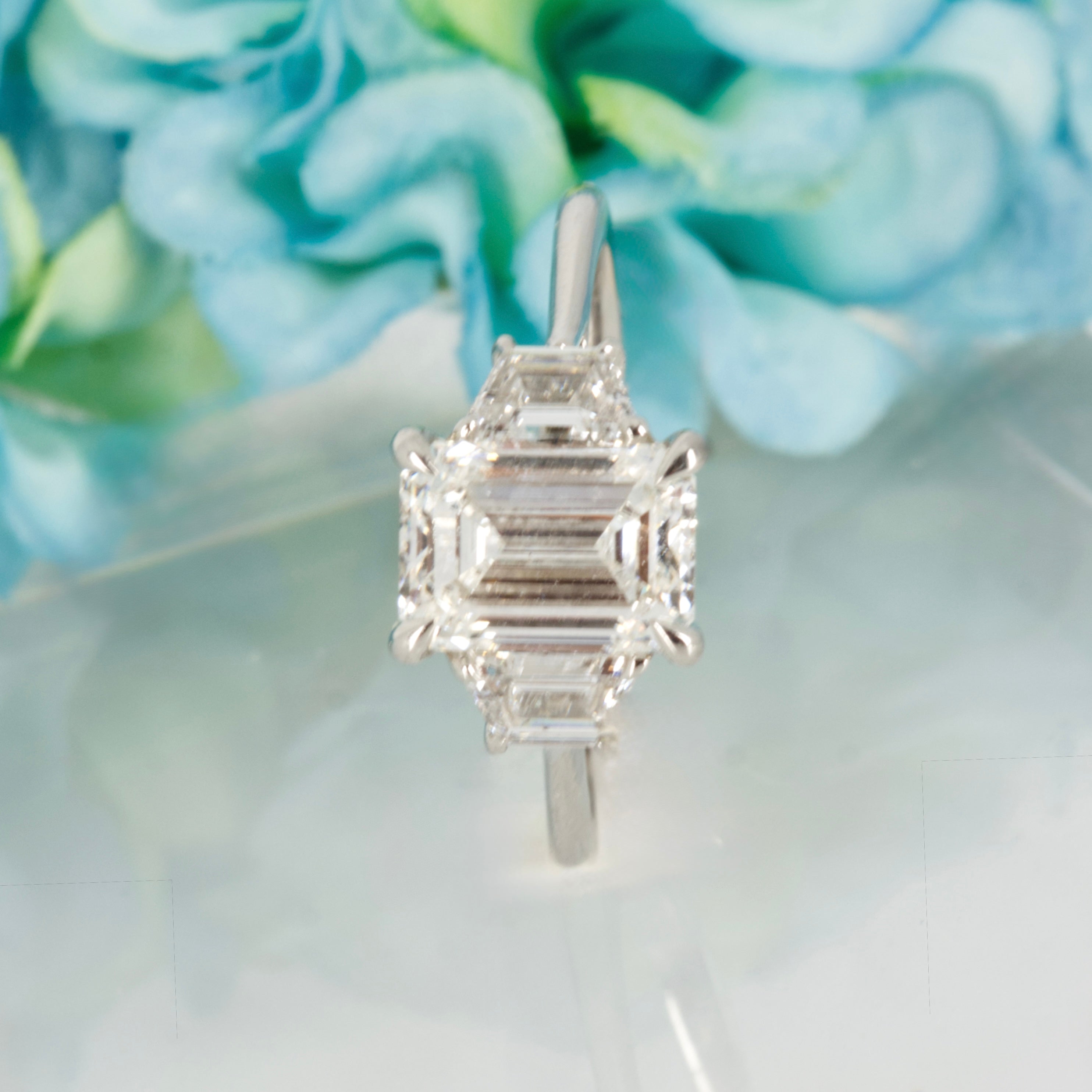 Platinum 2.63ct Emerald & Trapezoid Cut Lab Grown Diamond Trilogy Ring