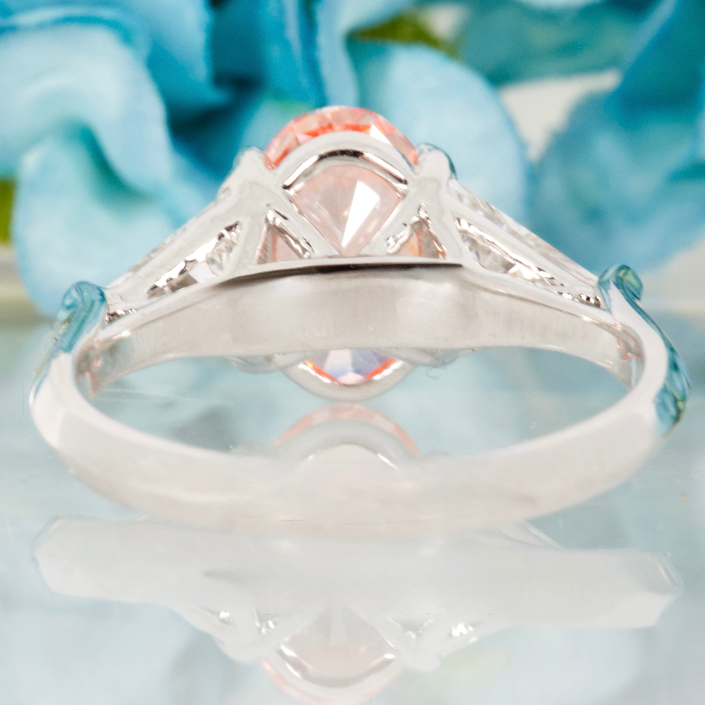 18ct White Gold Oval Cut Lab Grown Pink Diamond & Trilliant Cut Lab Grown Diamond Trilogy Ring