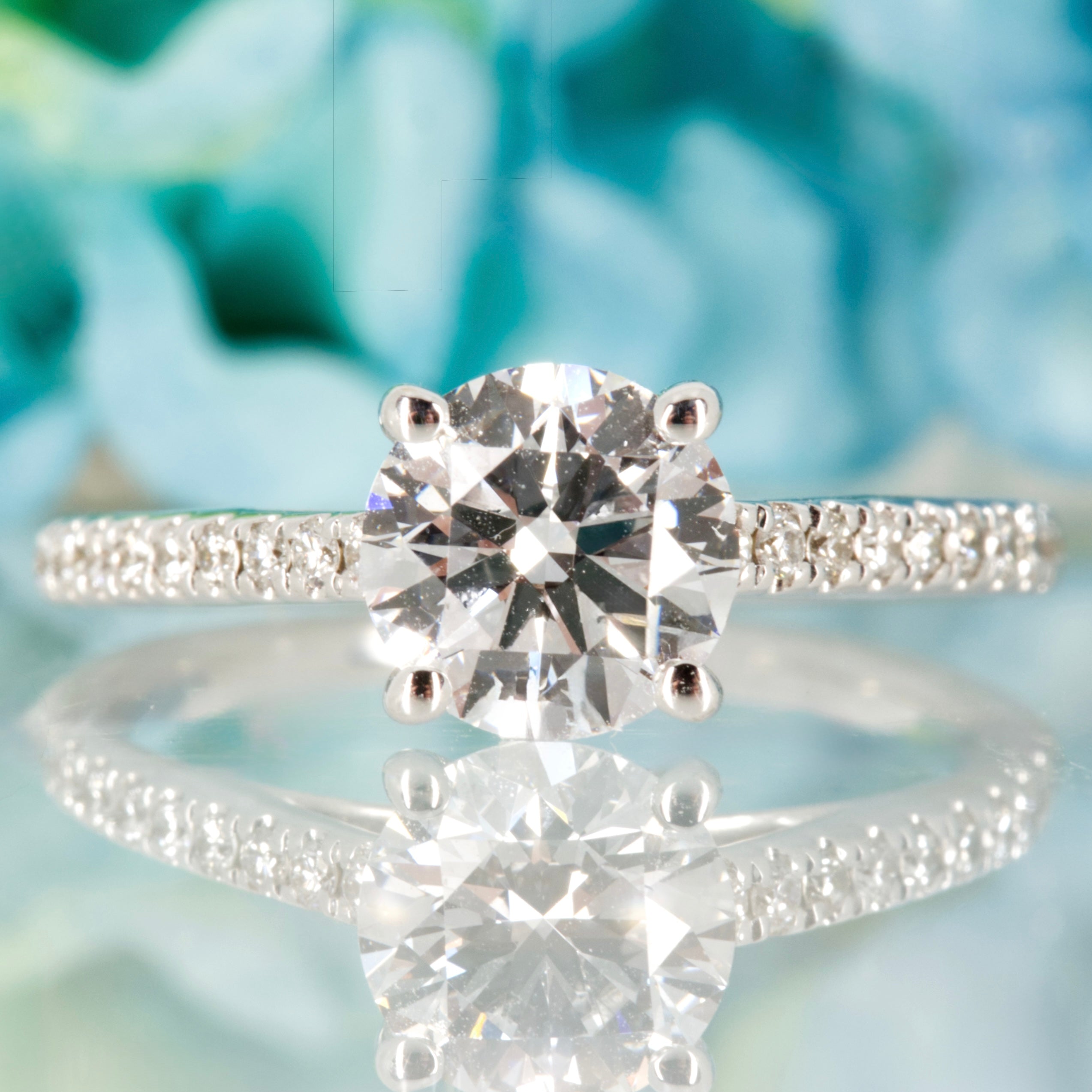 18ct White Gold 1.02ct Round Brilliant Cut Lab Grown Diamond Solitaire Ring with Lab Grown Diamond Set Shoulders