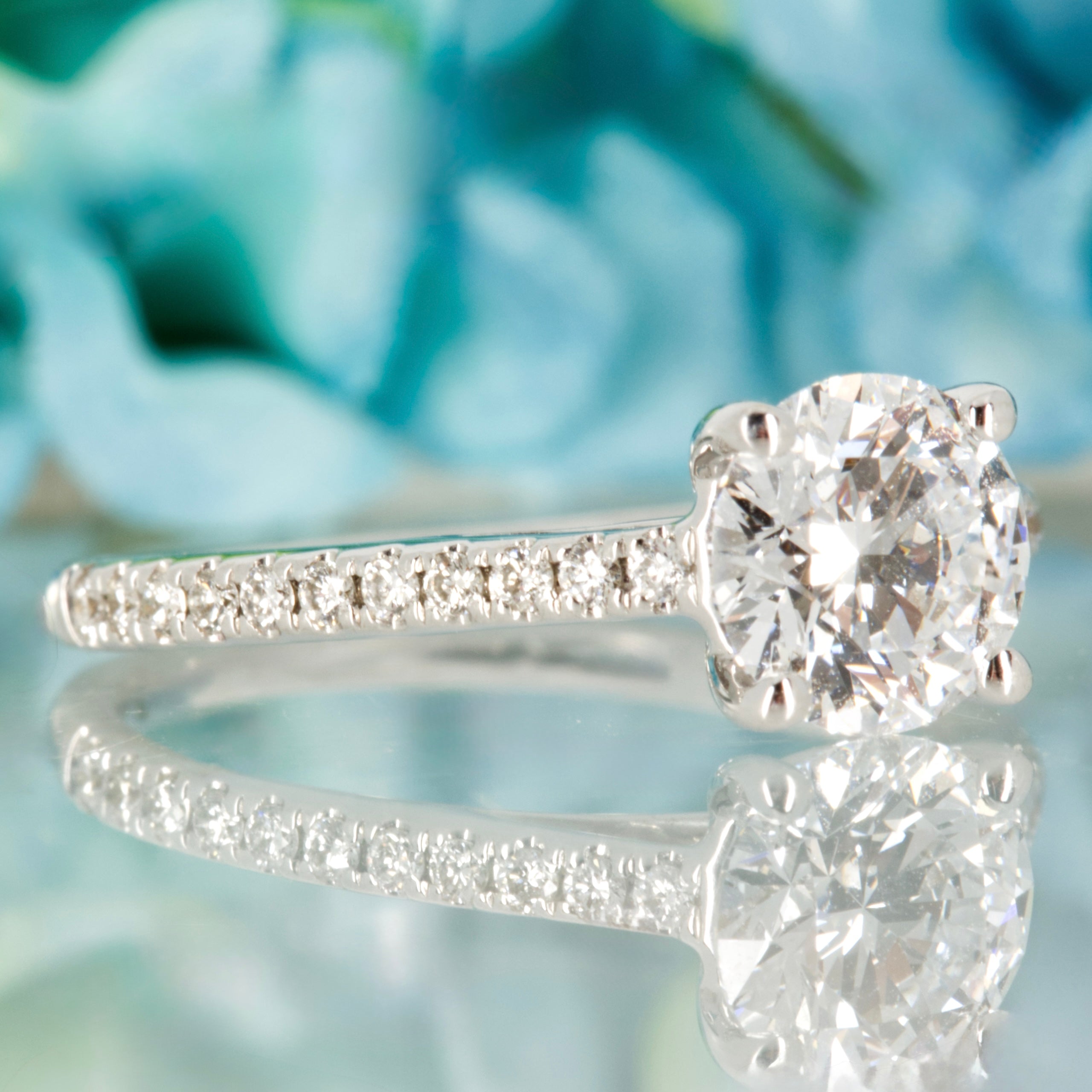 18ct White Gold 1.02ct Round Brilliant Cut Lab Grown Diamond Solitaire Ring with Lab Grown Diamond Set Shoulders