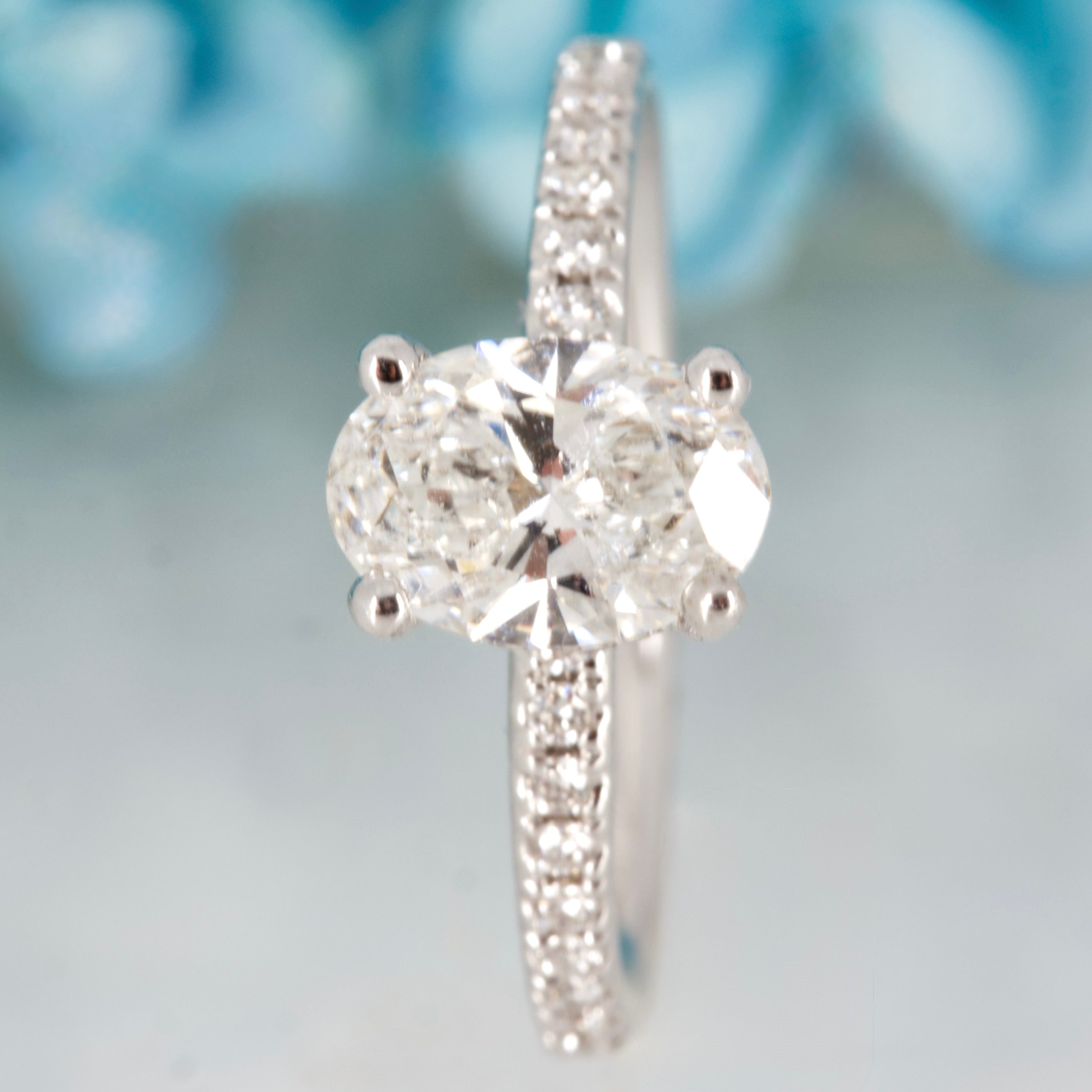 18ct White Gold 1.10ct Oval Cut Lab Grown Diamond Solitaire Ring with Lab Grown Diamond Shoulders