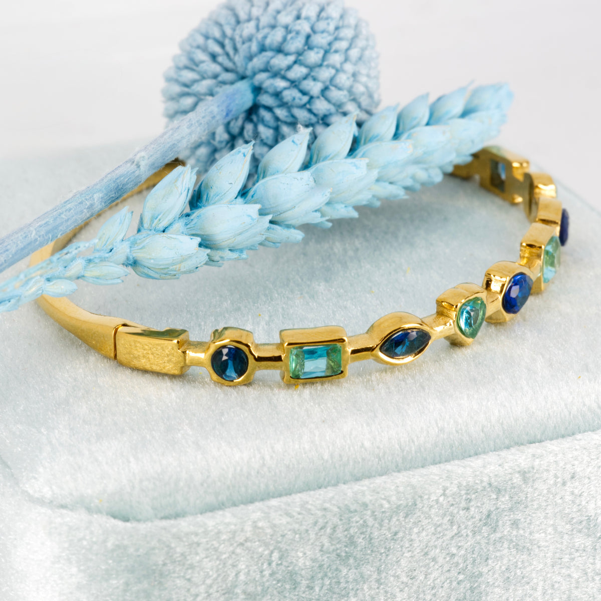 Gold Plated Blue Cubic Zirconia Set Hinged Bangle
