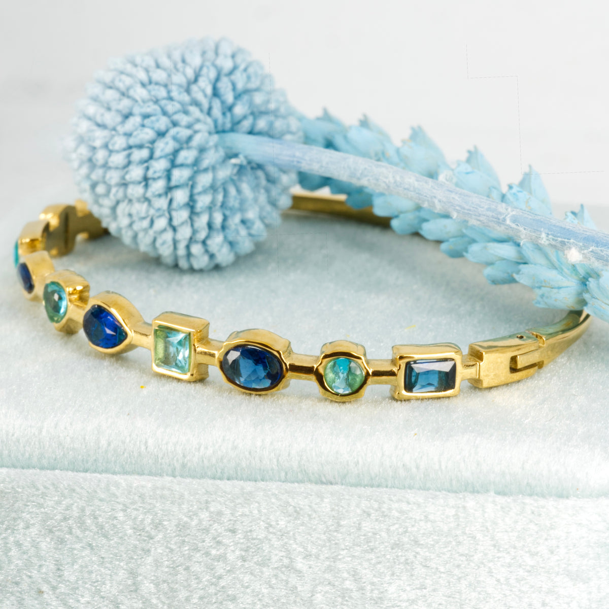 Gold Plated Blue Cubic Zirconia Set Hinged Bangle
