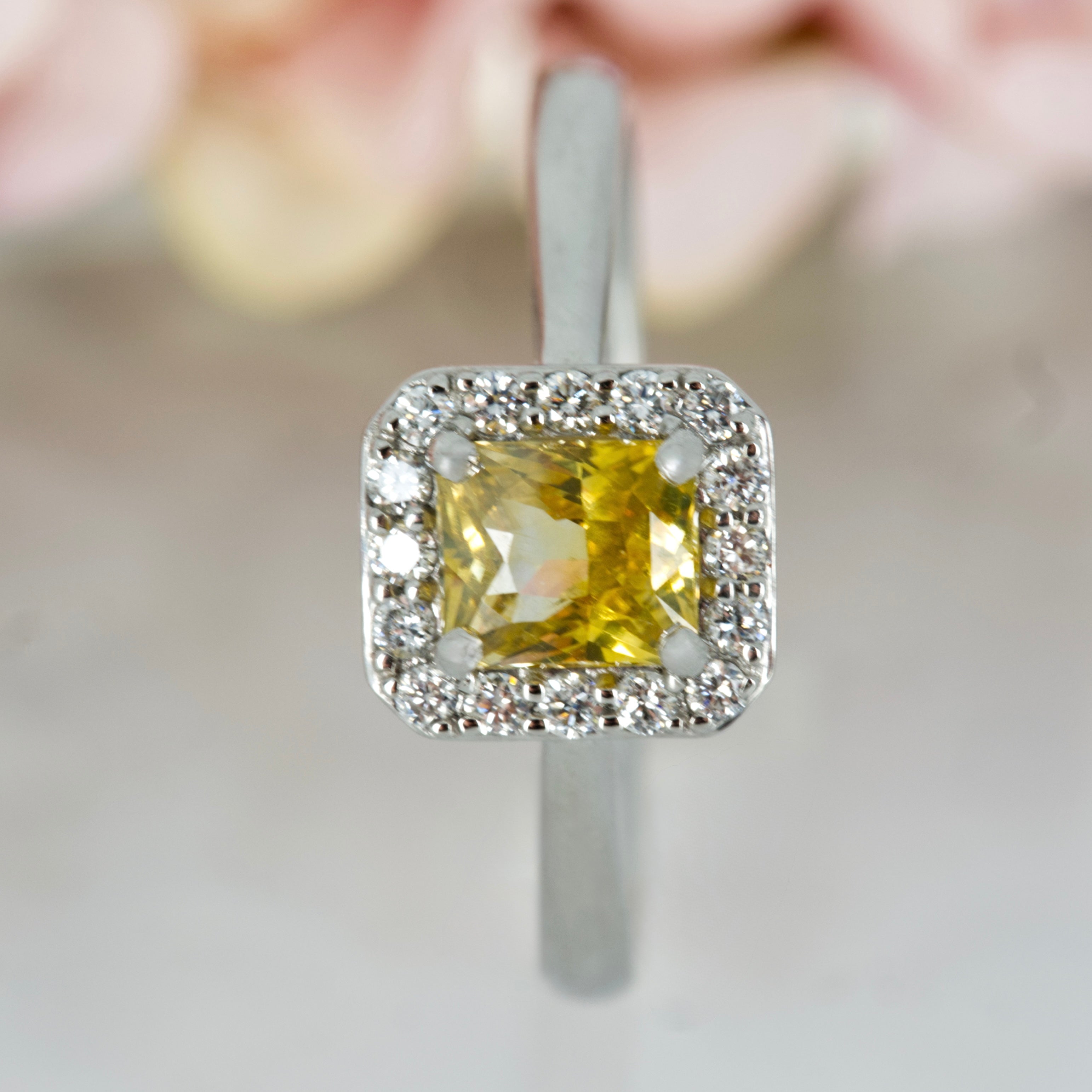 Platinum Radiant Cut Yellow Sapphire & Round Brilliant Cut Diamond Halo Cluster Ring