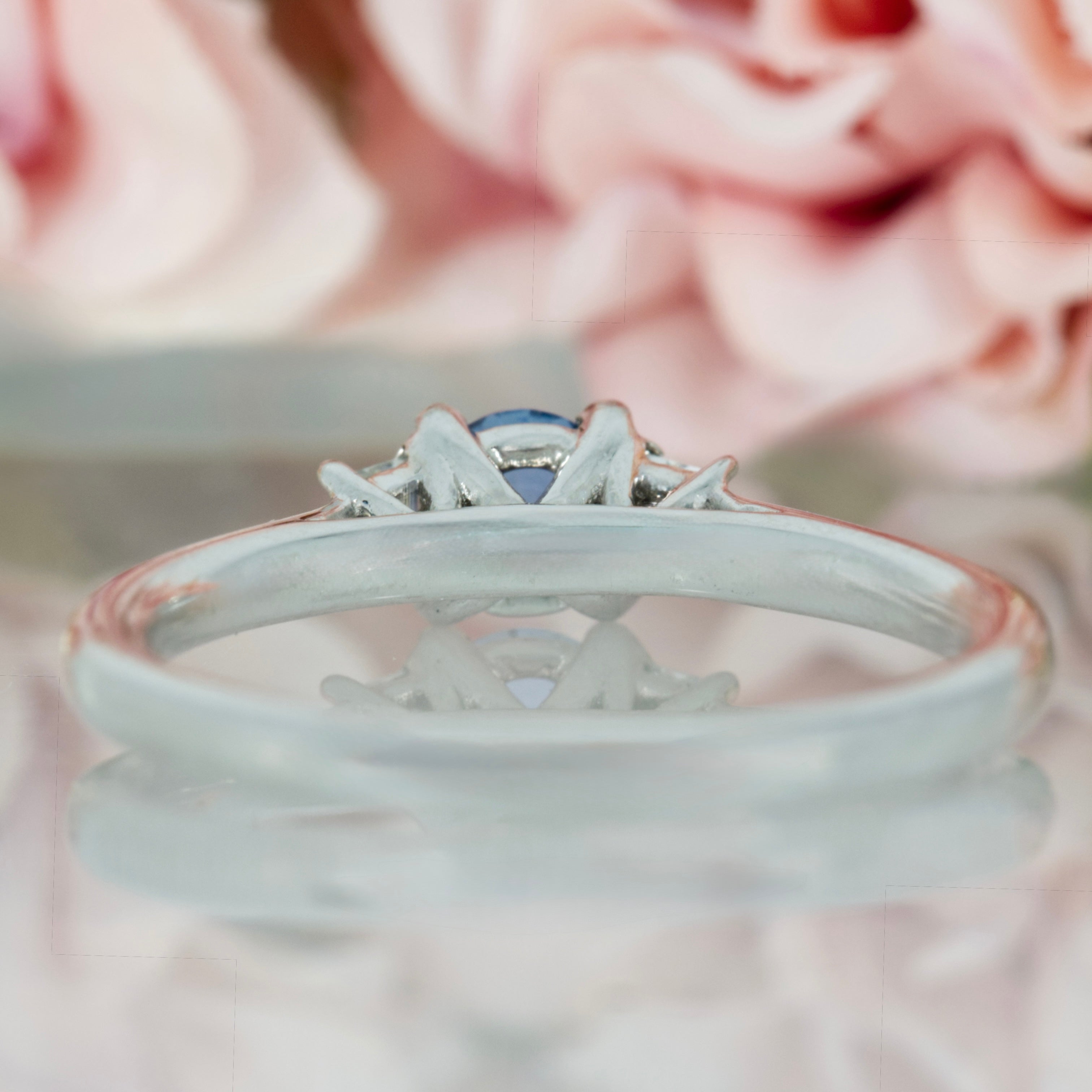 Platinum Round Cut Sapphire & Trapezoid Cut Diamond Trilogy Ring