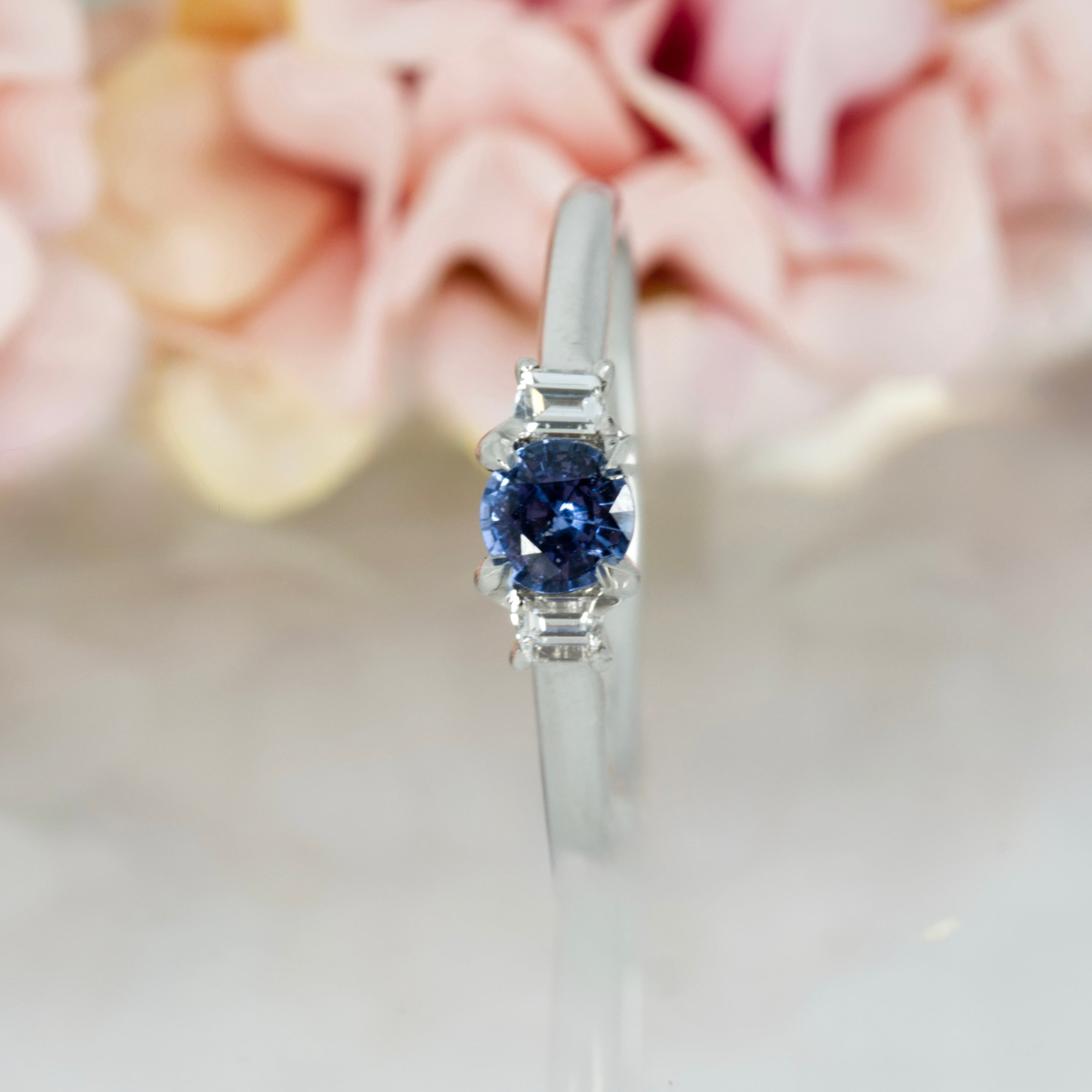 Platinum Round Cut Sapphire & Trapezoid Cut Diamond Trilogy Ring