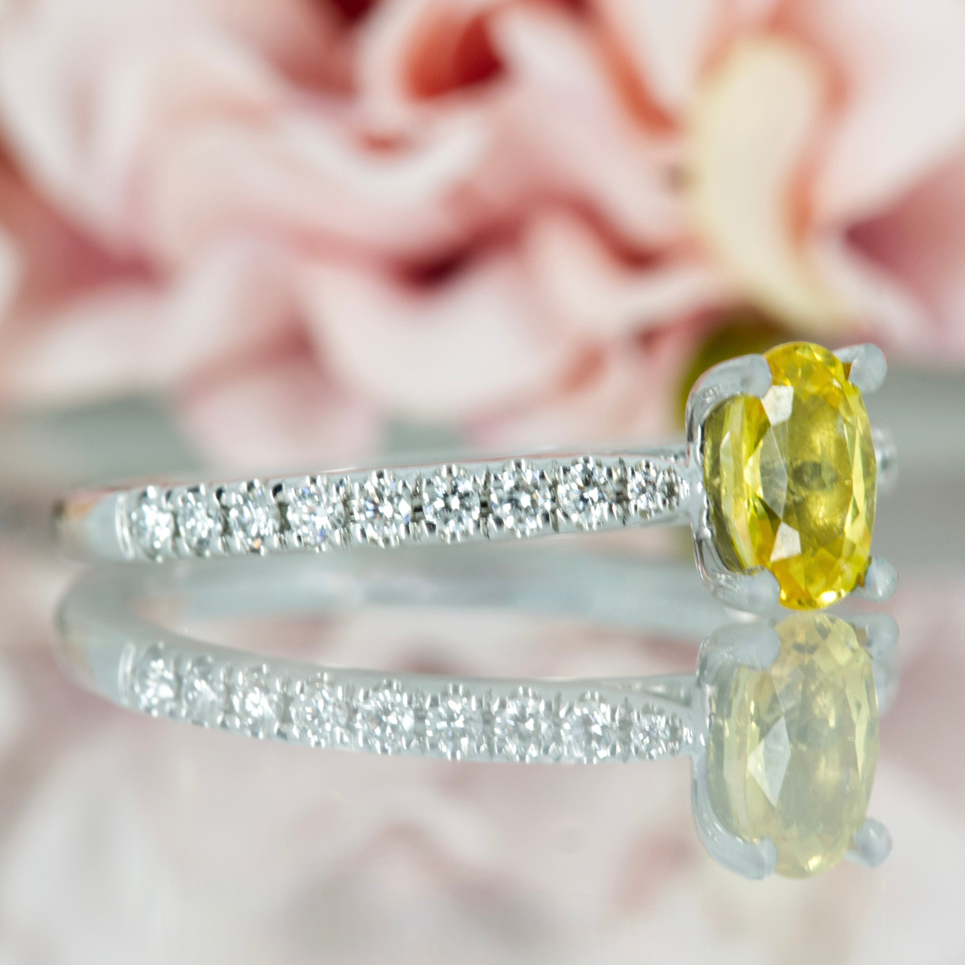 Platinum Oval Cut Yellow Sapphire & Round Brilliant Cut Diamond Ring