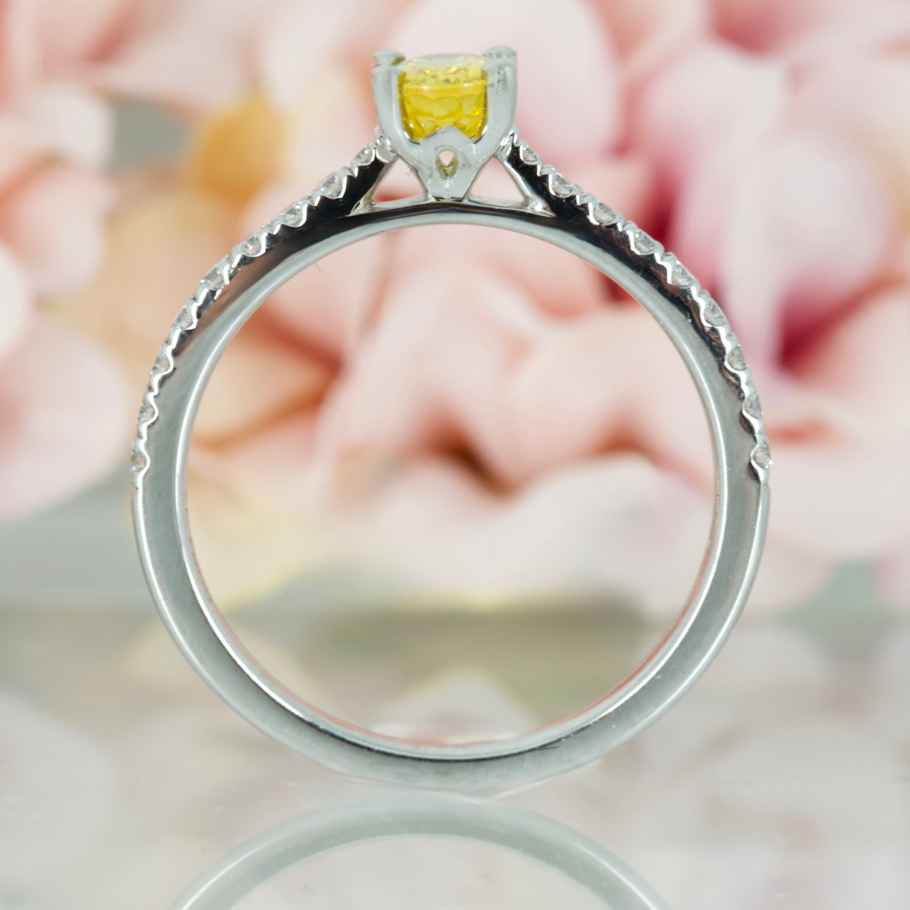 Platinum Oval Cut Yellow Sapphire & Round Brilliant Cut Diamond Ring