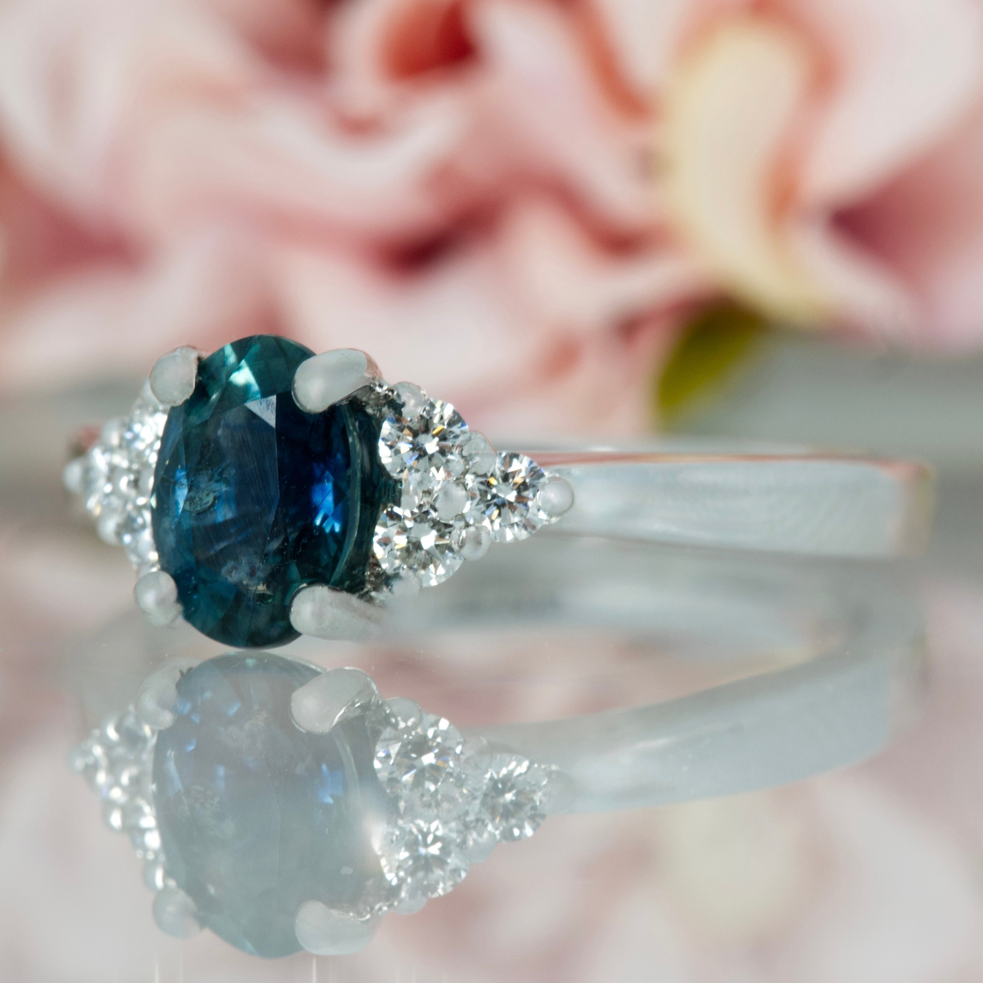 Platinum Oval Cut Montana Blue Sapphire & Round Brilliant Cut Diamond Trefoil Ring