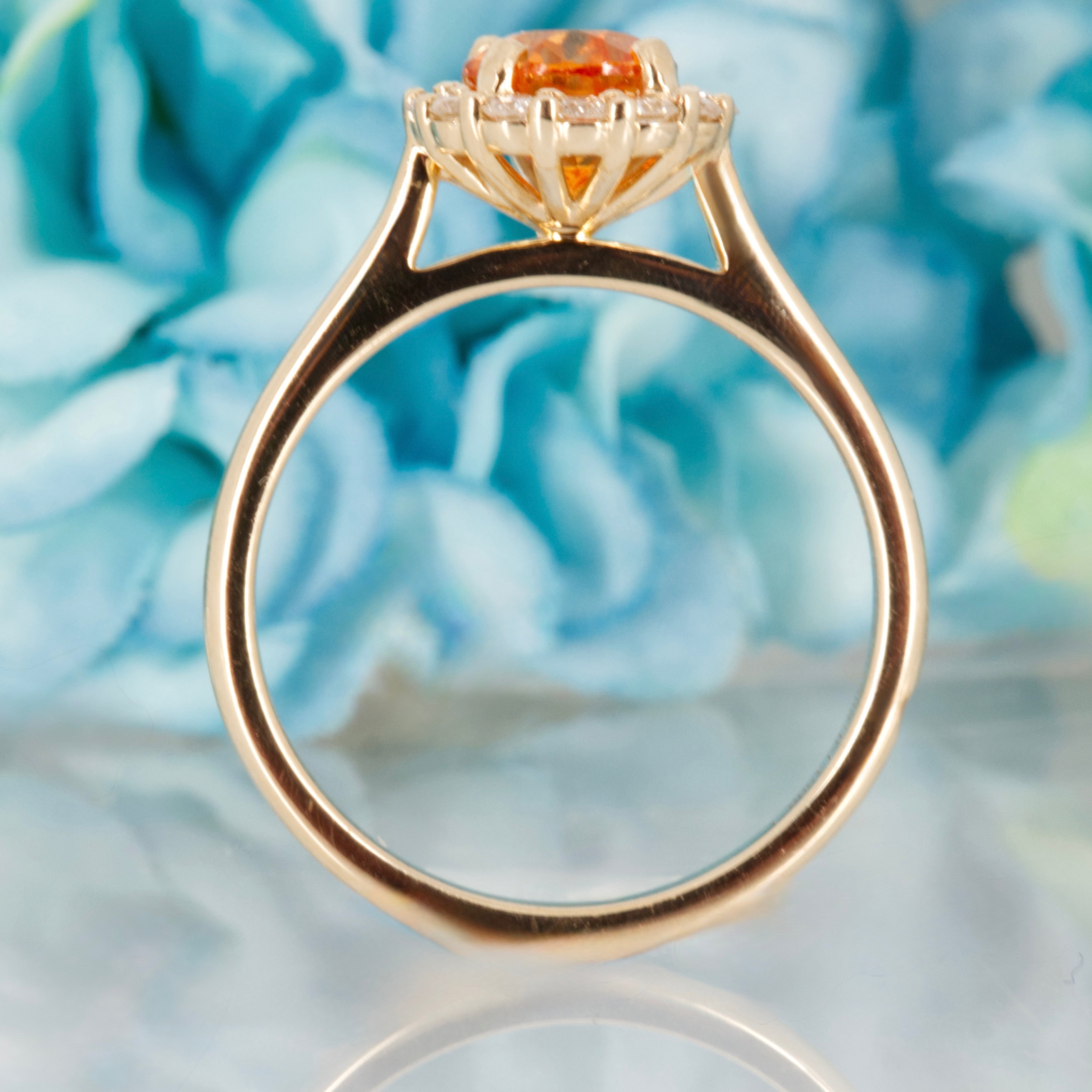 9ct Yellow Gold Oval Cut Spessartite Garnet & Round Brilliant Cut Diamond Halo Cluster Ring