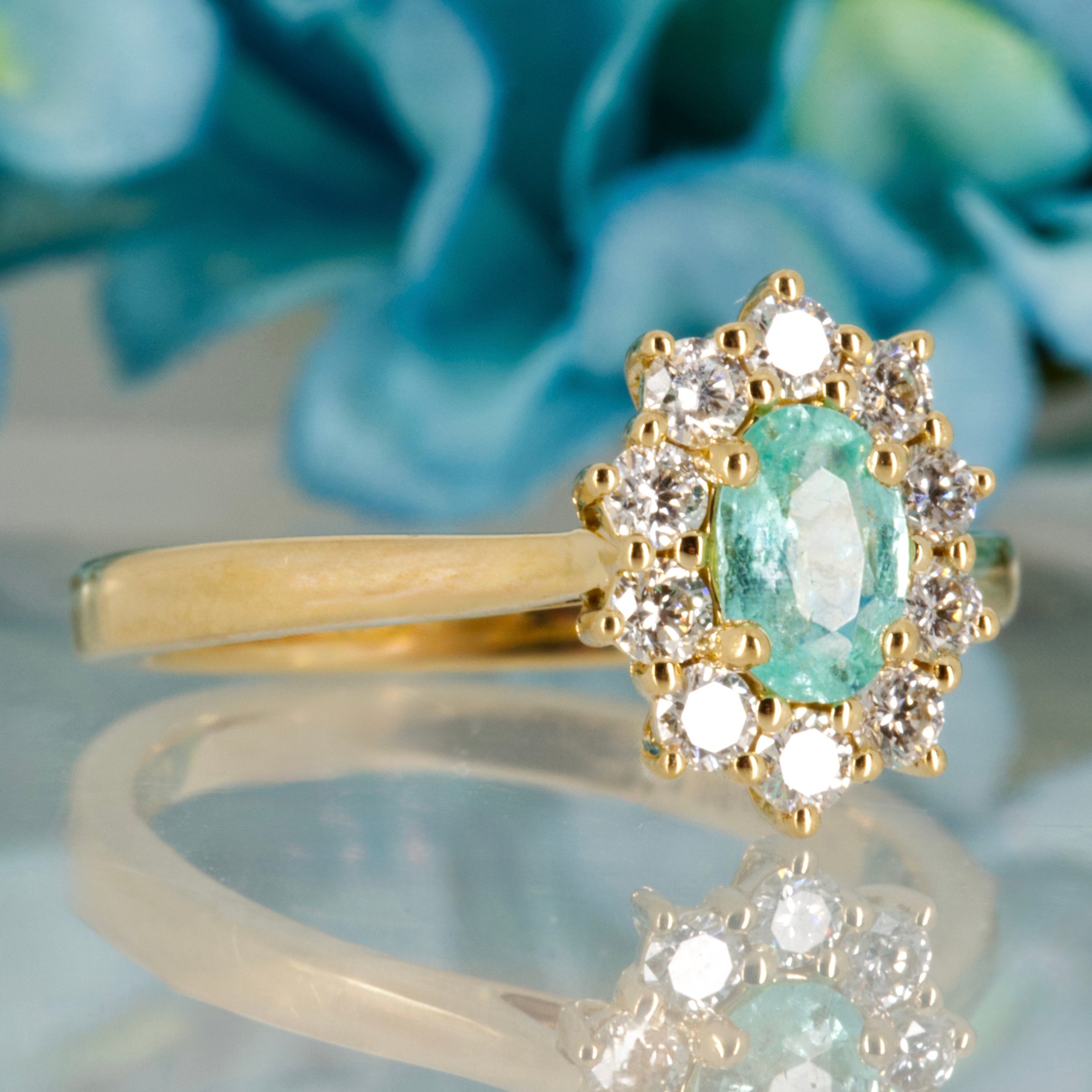 18ct Yellow Gold Oval Cut Paraiba Tourmaline & Round Brilliant Cut Diamond Cluster Ring
