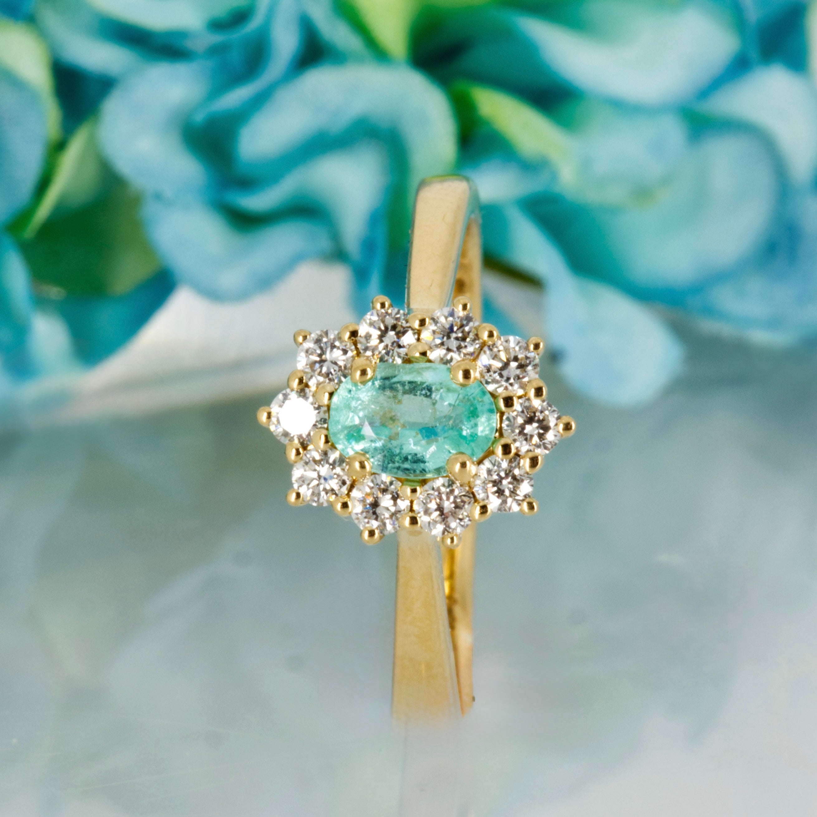 18ct Yellow Gold Oval Cut Paraiba Tourmaline & Round Brilliant Cut Diamond Cluster Ring