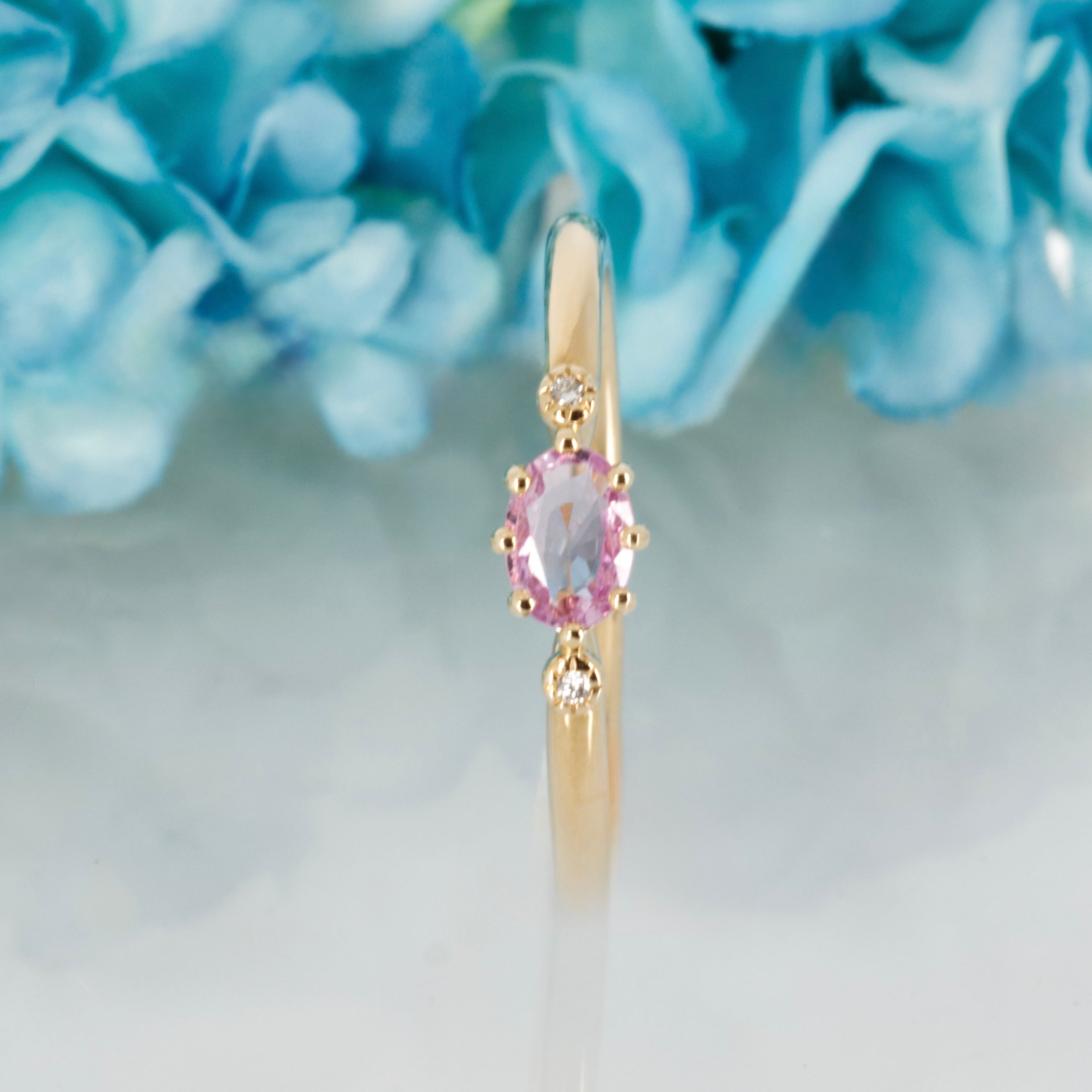 9ct Yellow Gold Oval Cut Pink Sapphire & Round Brilliant Cut Diamond Trilogy Ring