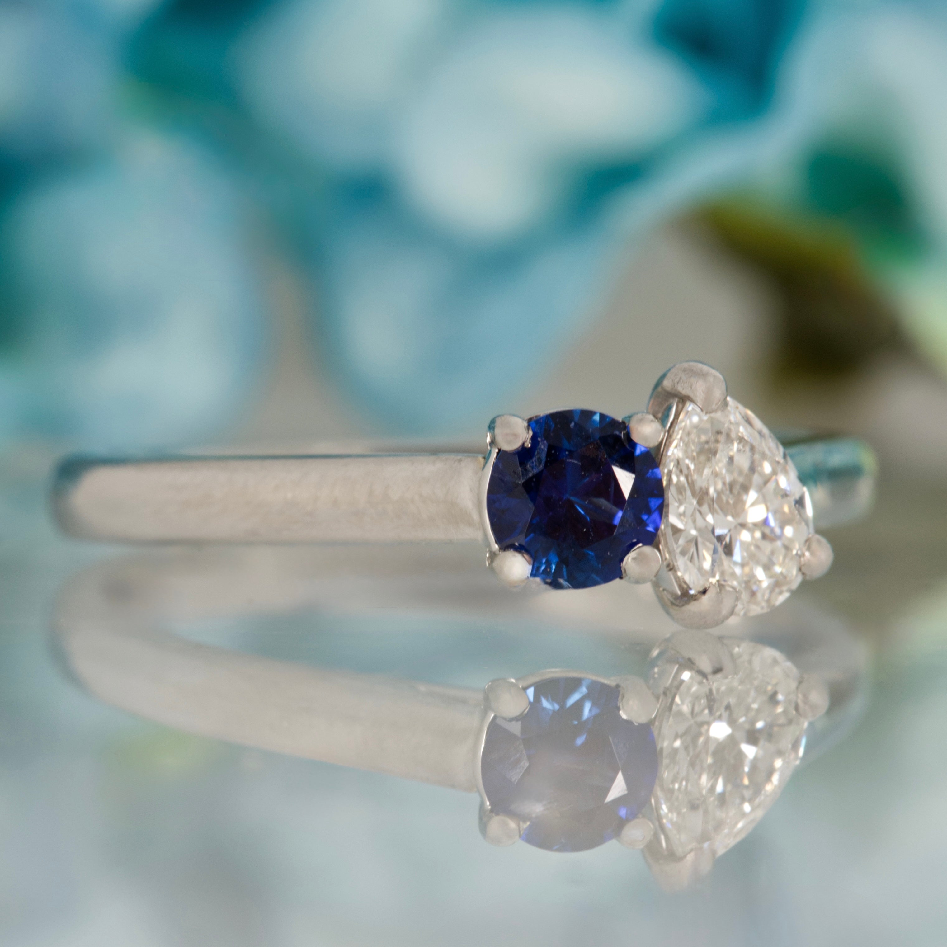 Platinum Round Cut Sapphire & Pear Cut Diamond Toi et Moi Ring